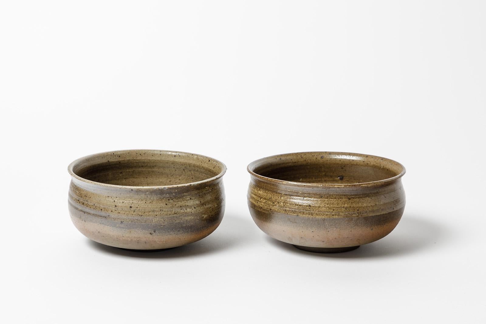 Askett

Pair of stoneware ceramic bowls by Askett

Realised in La Borne

Circa 1970

Original good condition

height 8 cm
Large 15 cm