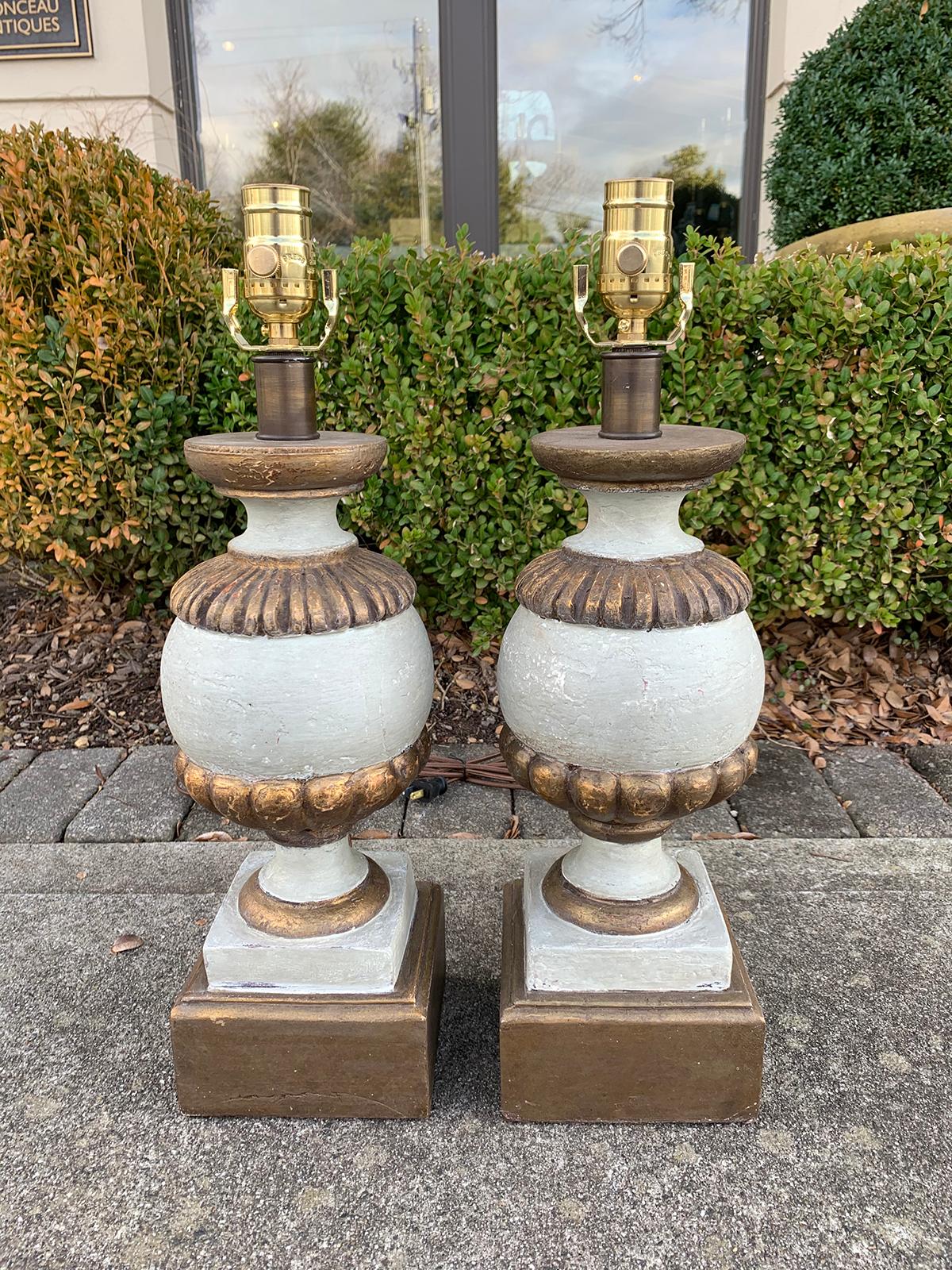Pair of 20th century carved wood lamps with custom finish
new wiring.