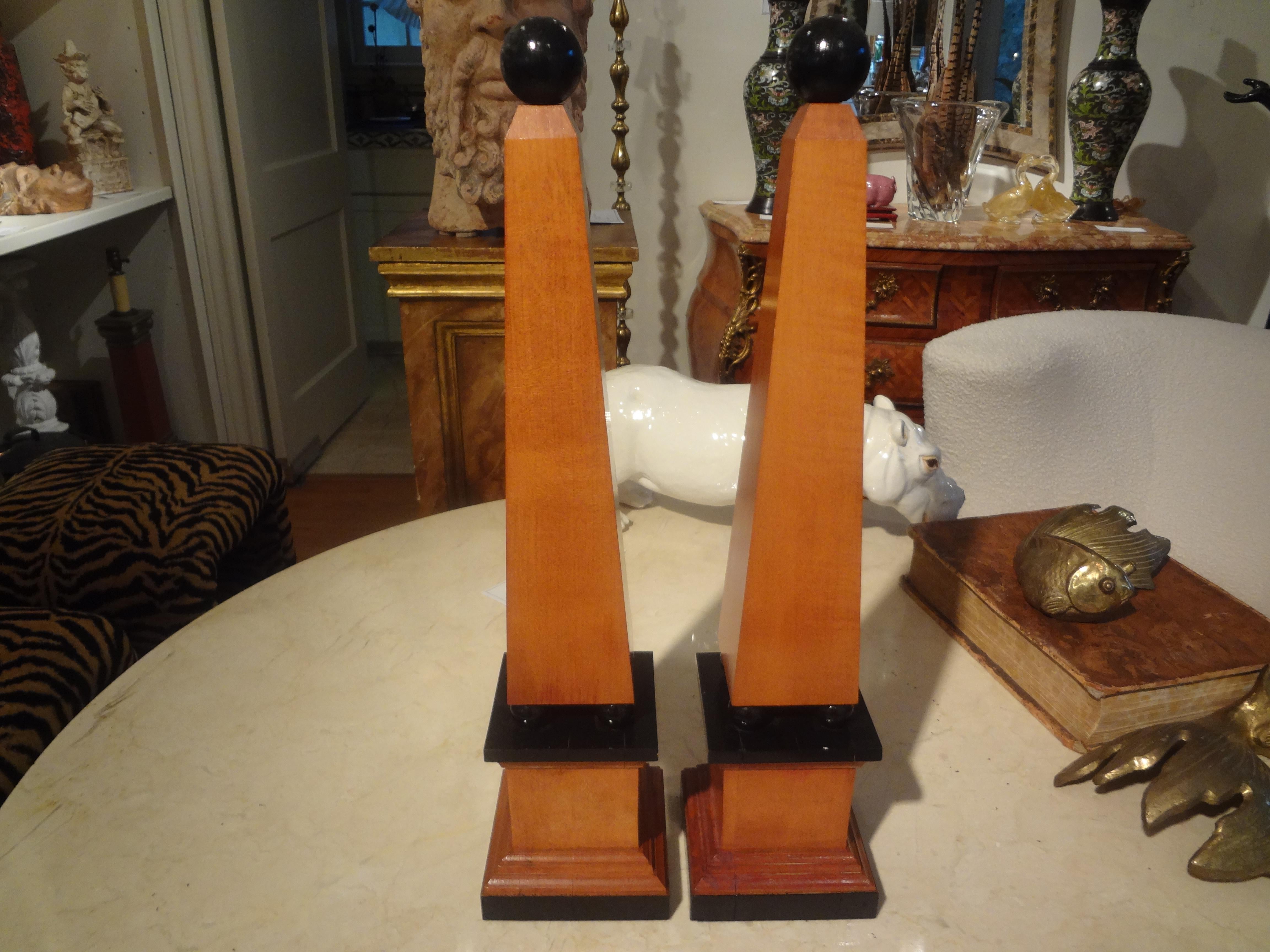Pair of 20th Century Carved Wood Obelisks.
Handsome pair of 20th century Neoclassical style black and brown carved wood obelisks.
This listing is for a pair.