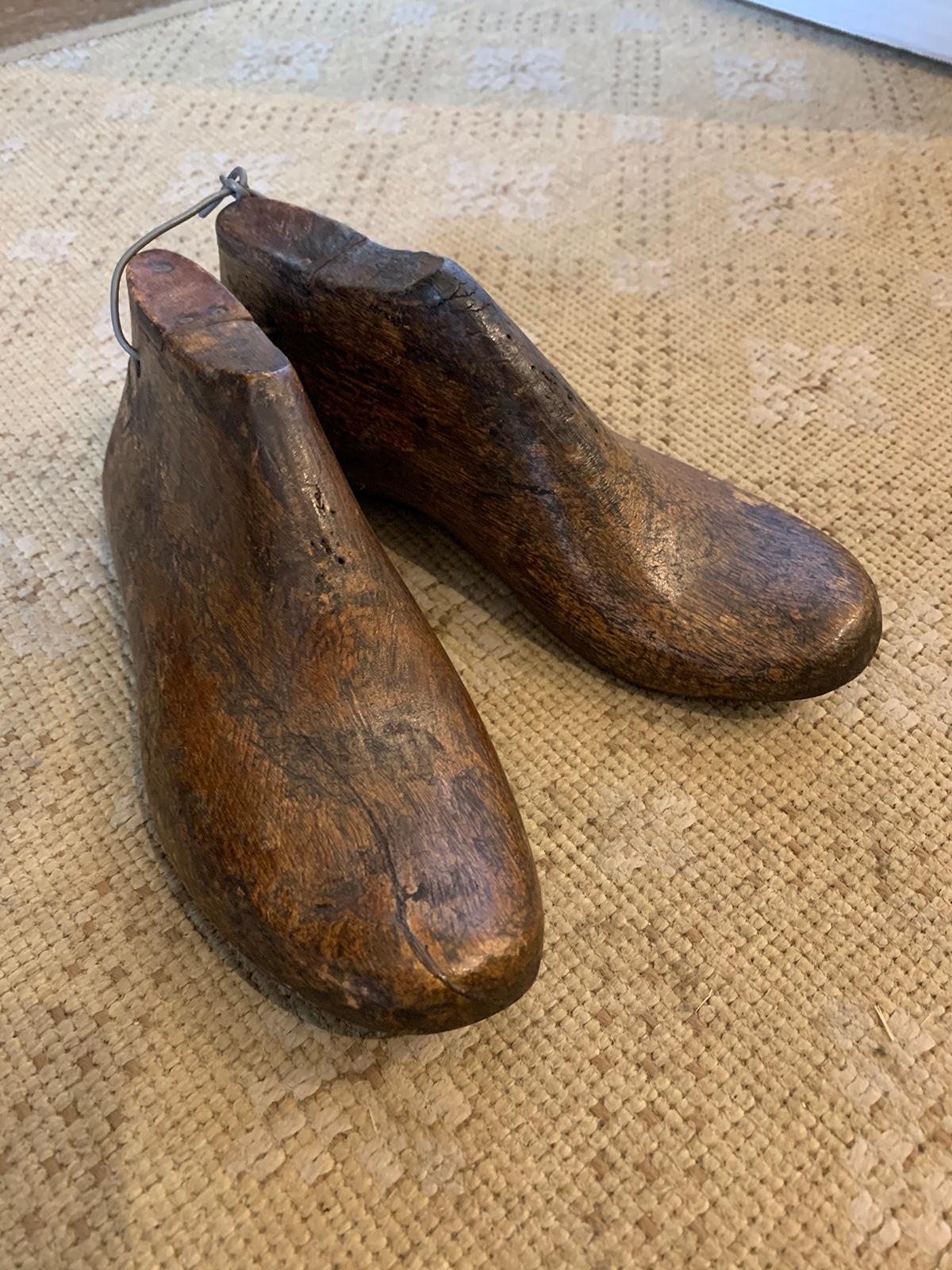 Pair of 20th century children's wooden shoe molds.