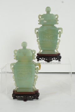 Pair of 20th Century Chinese Carved Bowenite Lidded Urns.