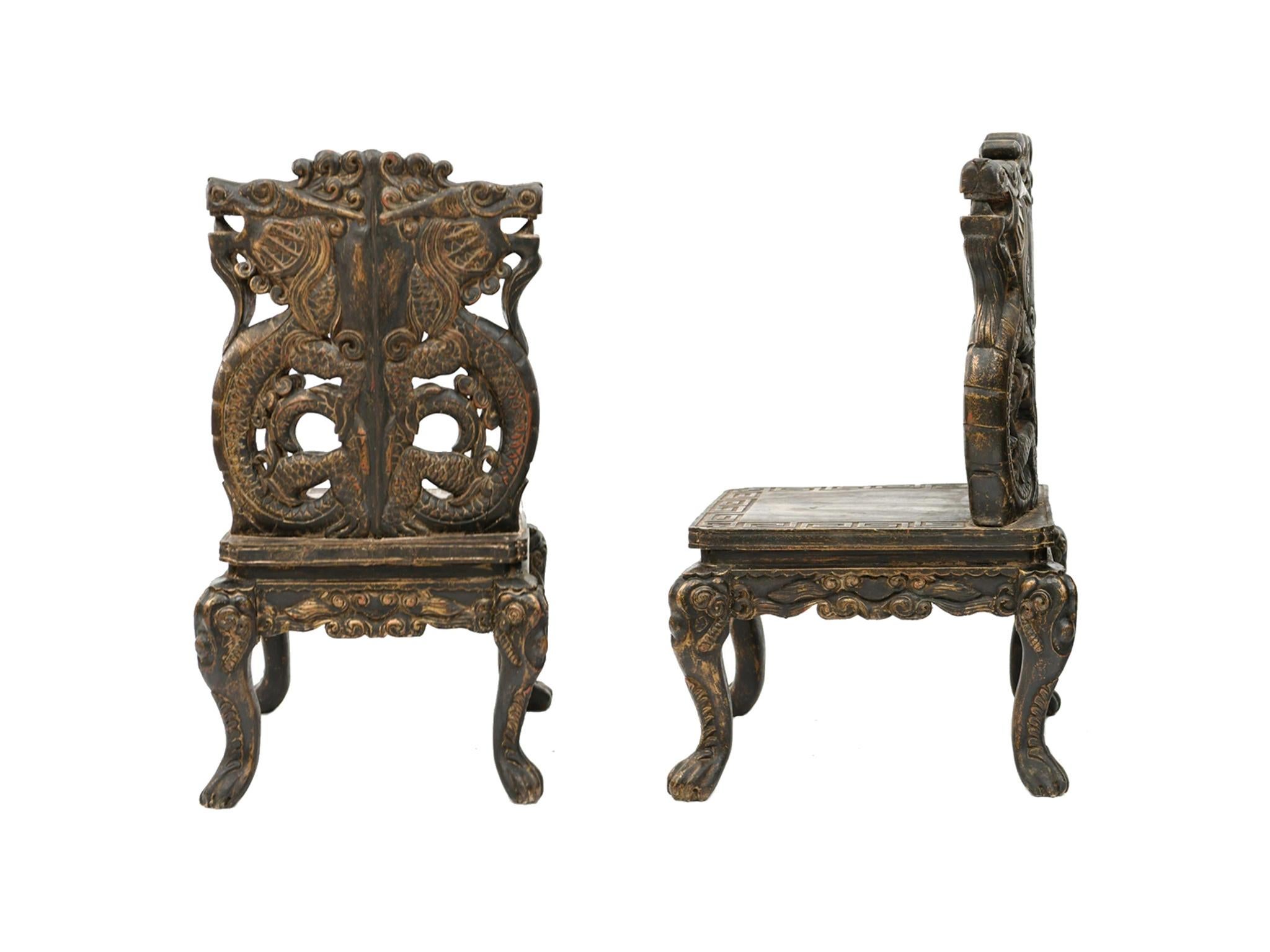 Wood Pair of 20th Century Chinese Carved Side Chairs with Dragon Design