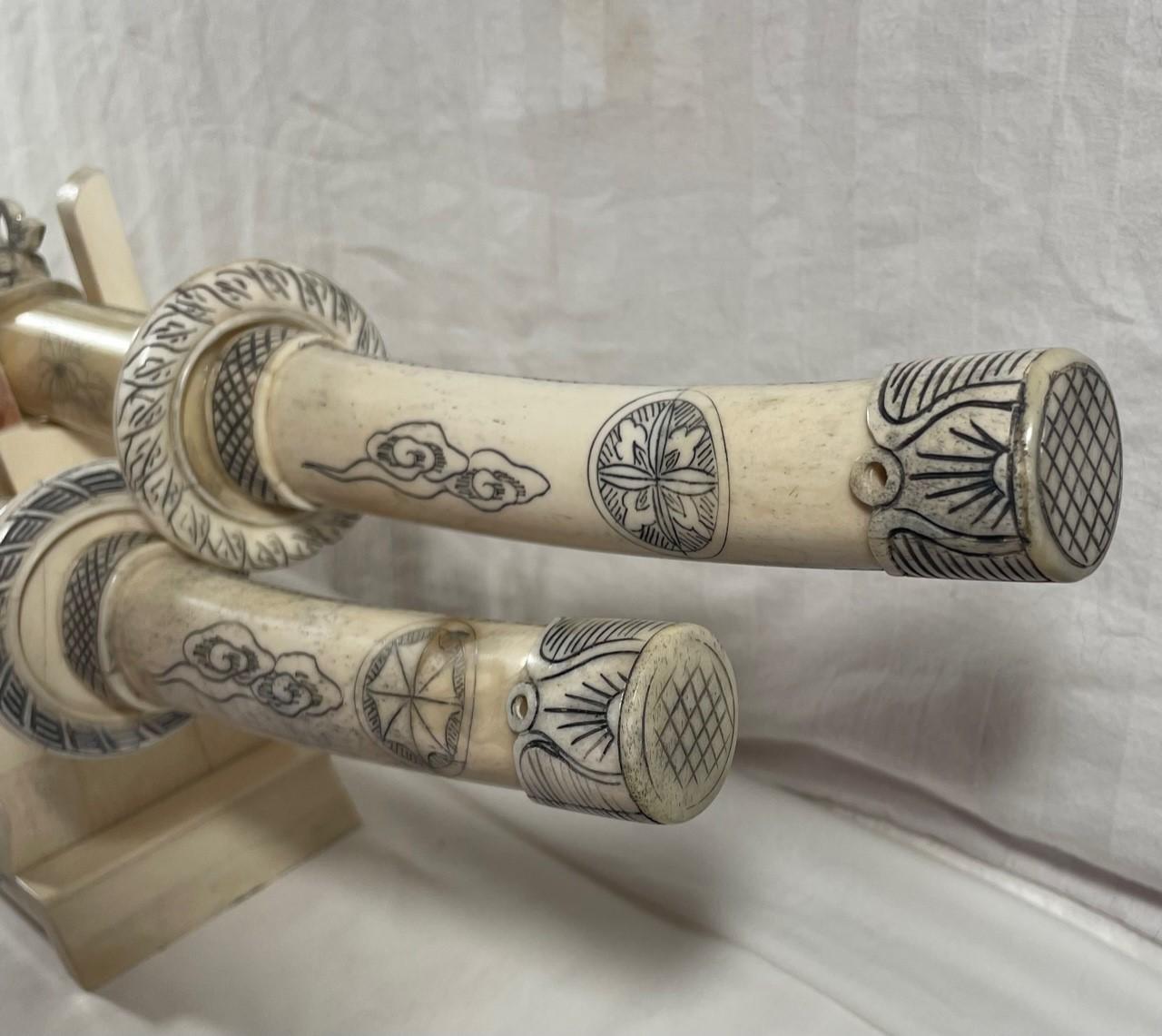 Engraved Pair of 20th Century Chinese Incised Bone Samurai Style Swords