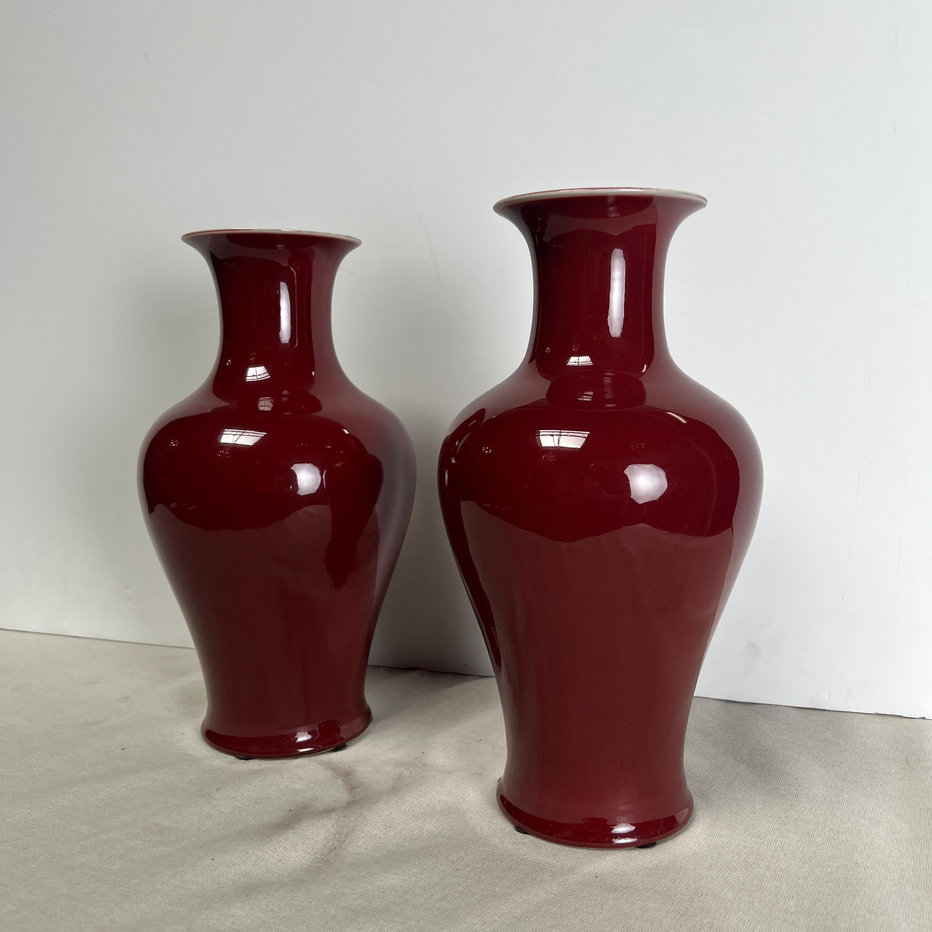 Hand-Crafted Pair of 20th Century Chinese Porcelain Oxblood Glazed Vases For Sale