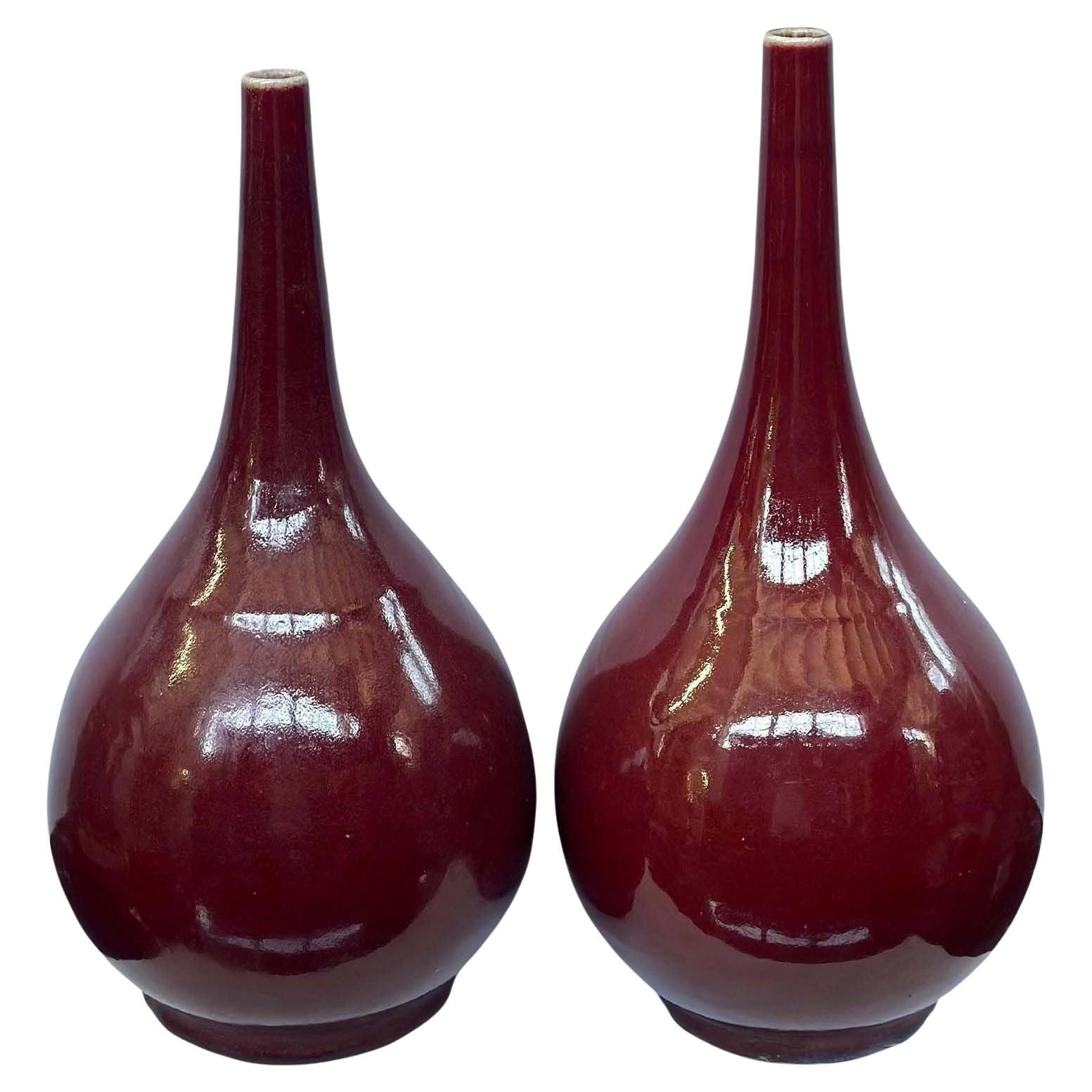 Pair of 20th Century Chinese Sang de Boeuf Vases