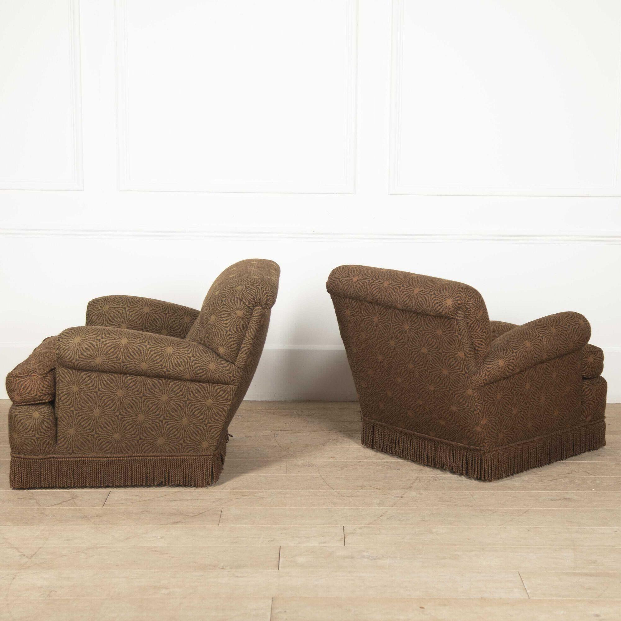 Superb pair of 20th century club armchairs by Maison Jansen. 
These stylish armchairs are attributed to the master of interior decor Maison Jansen. The Paris-based firm was founded in 1880 and quickly became the first global design firm, serving