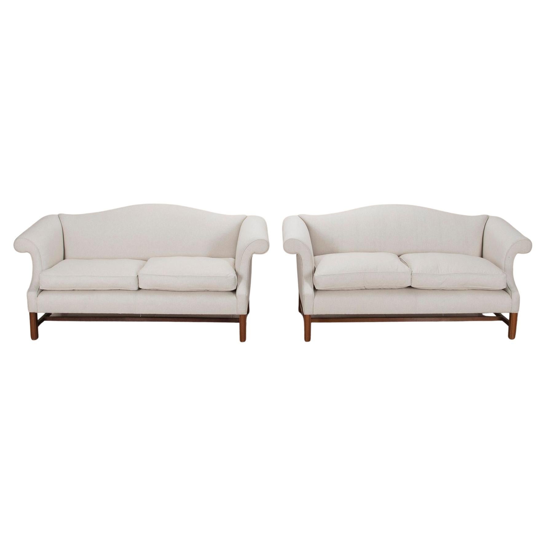 Pair of 20th Century English Camel Back Sofas For Sale