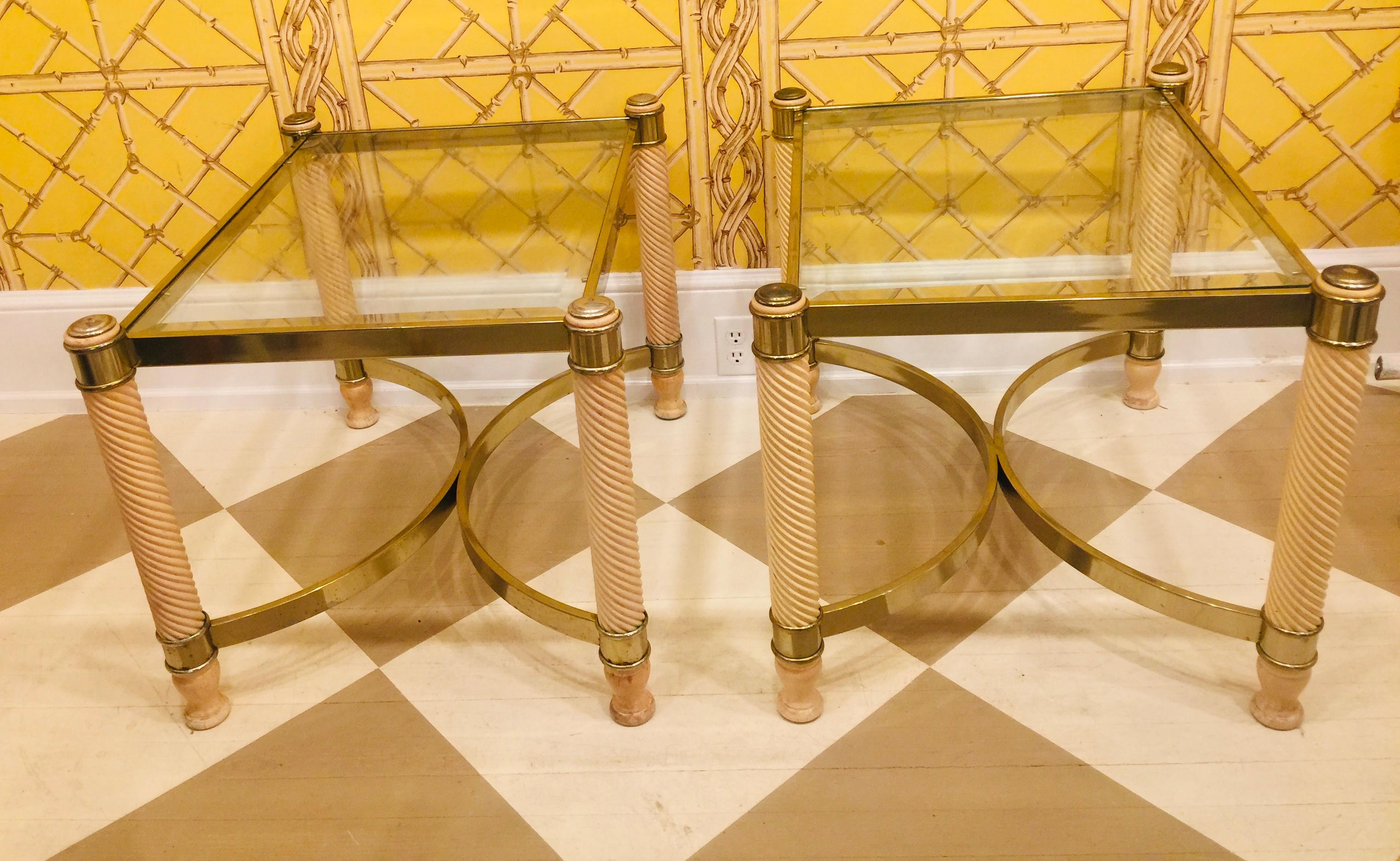 Pair of early 20th century English gilt metal, carved wood, glass top end tables, cocktail tables. Legs of carved turned form painted in faux ivory color to resemble
Carved ivory.