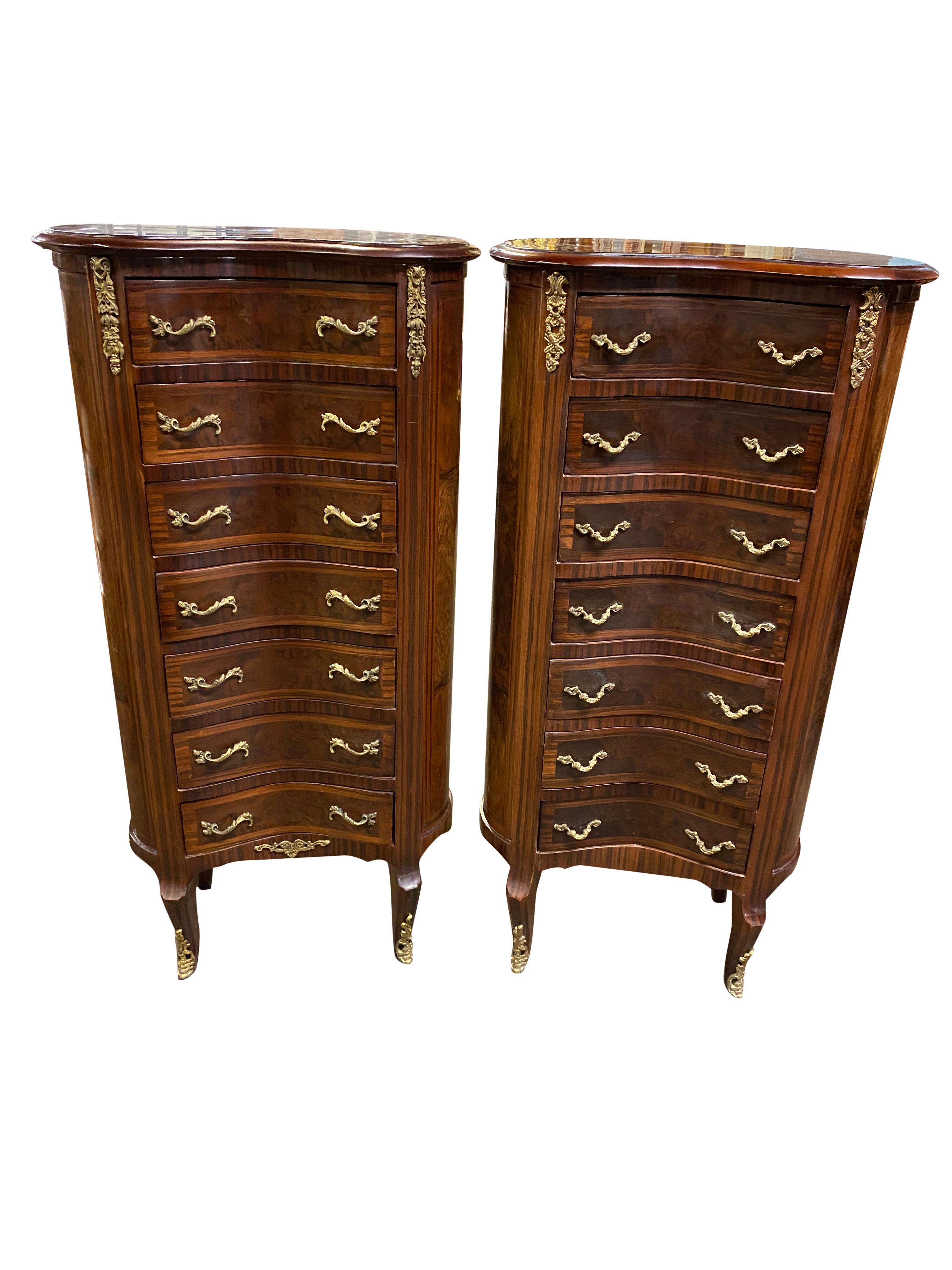 A stunning pair of 20th century English Regency style side tables/cabinets. A gorgeous and elegant design perfect for modern interiors.