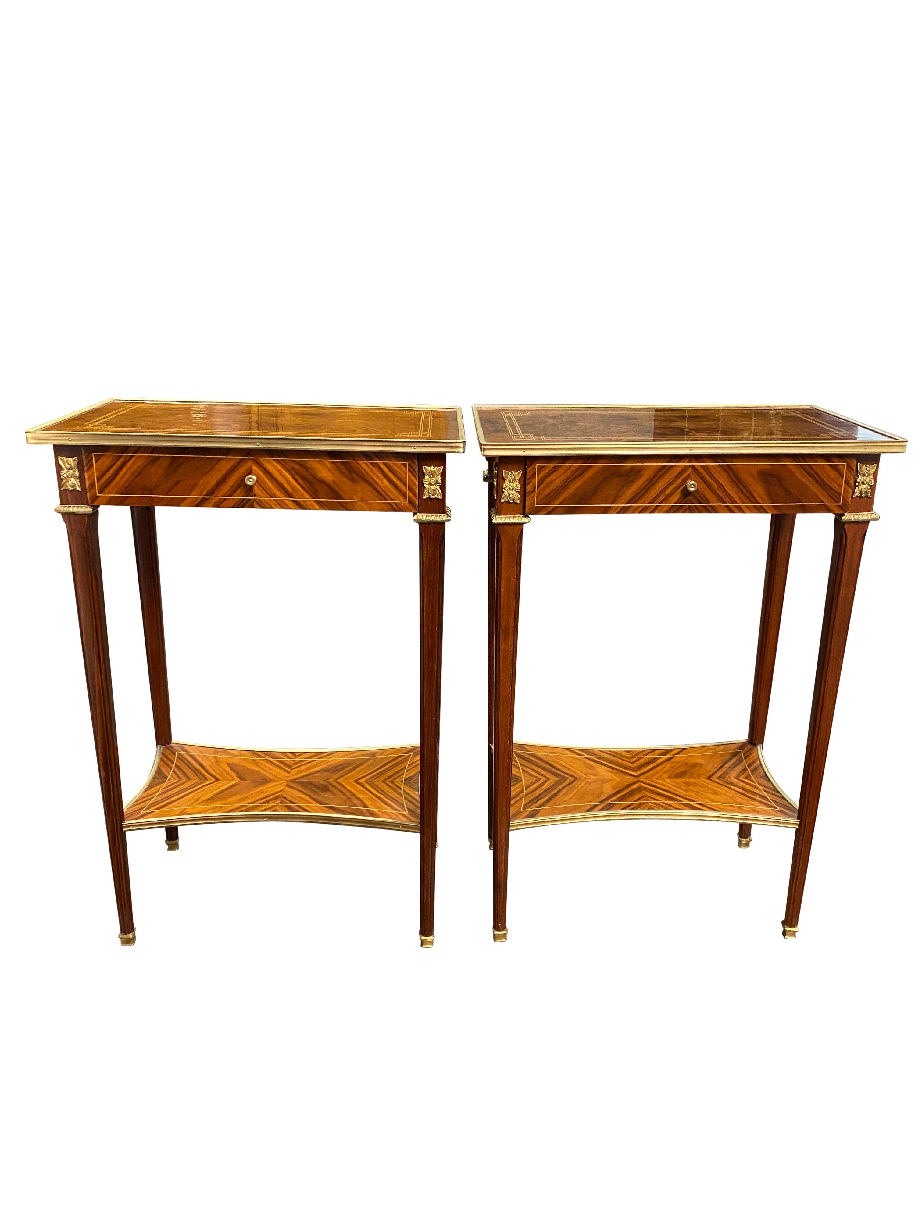 A stunning pair of 20th century English Regency style side tables. A gorgeous and elegant design perfect for modern interiors.