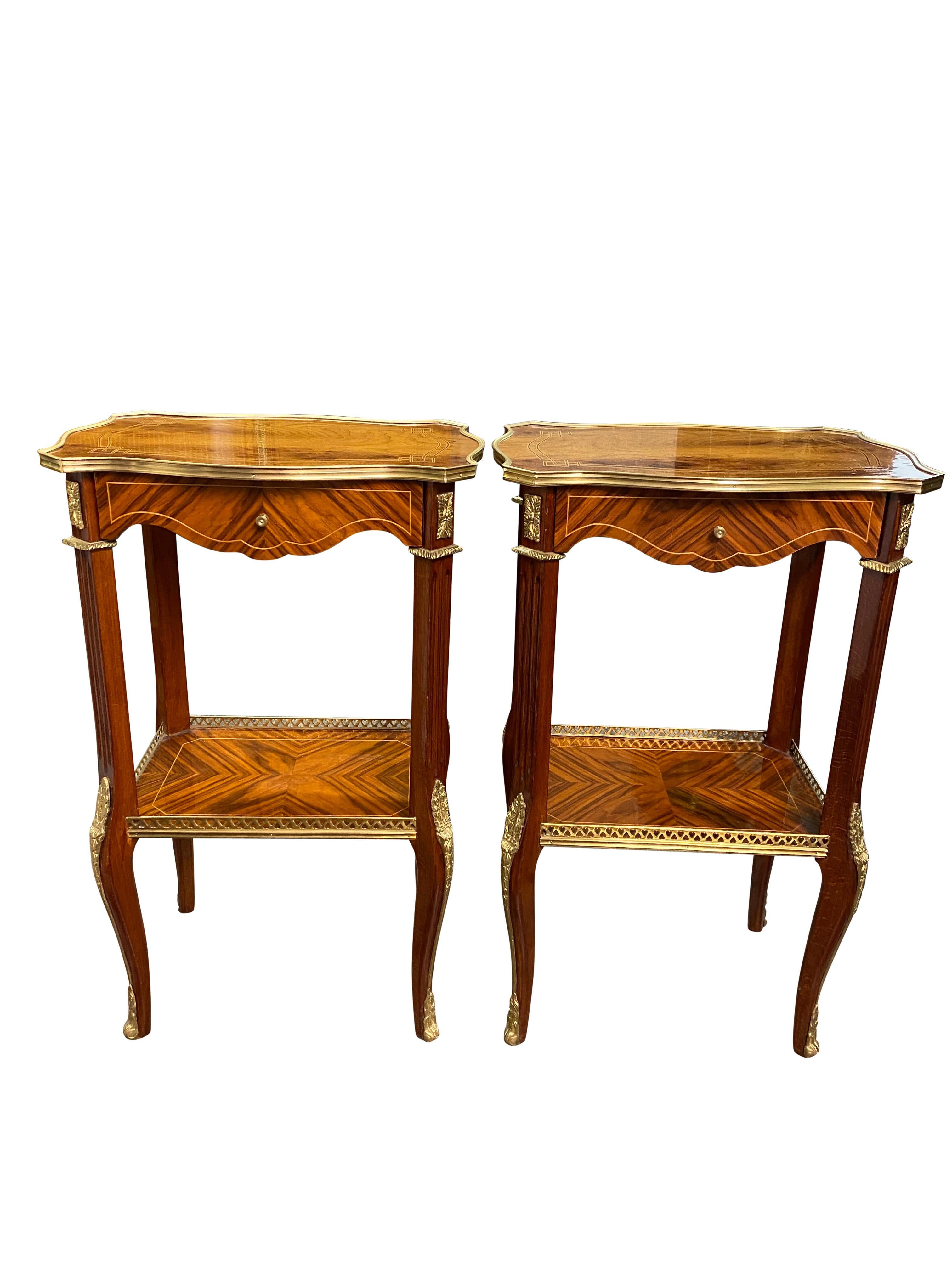 A stunning pair of 20th century English Regency style side tables. A gorgeous and elegant design perfect for modern interiors. 

Measurements (cm):
Height 71
Width 51
Depth 41.