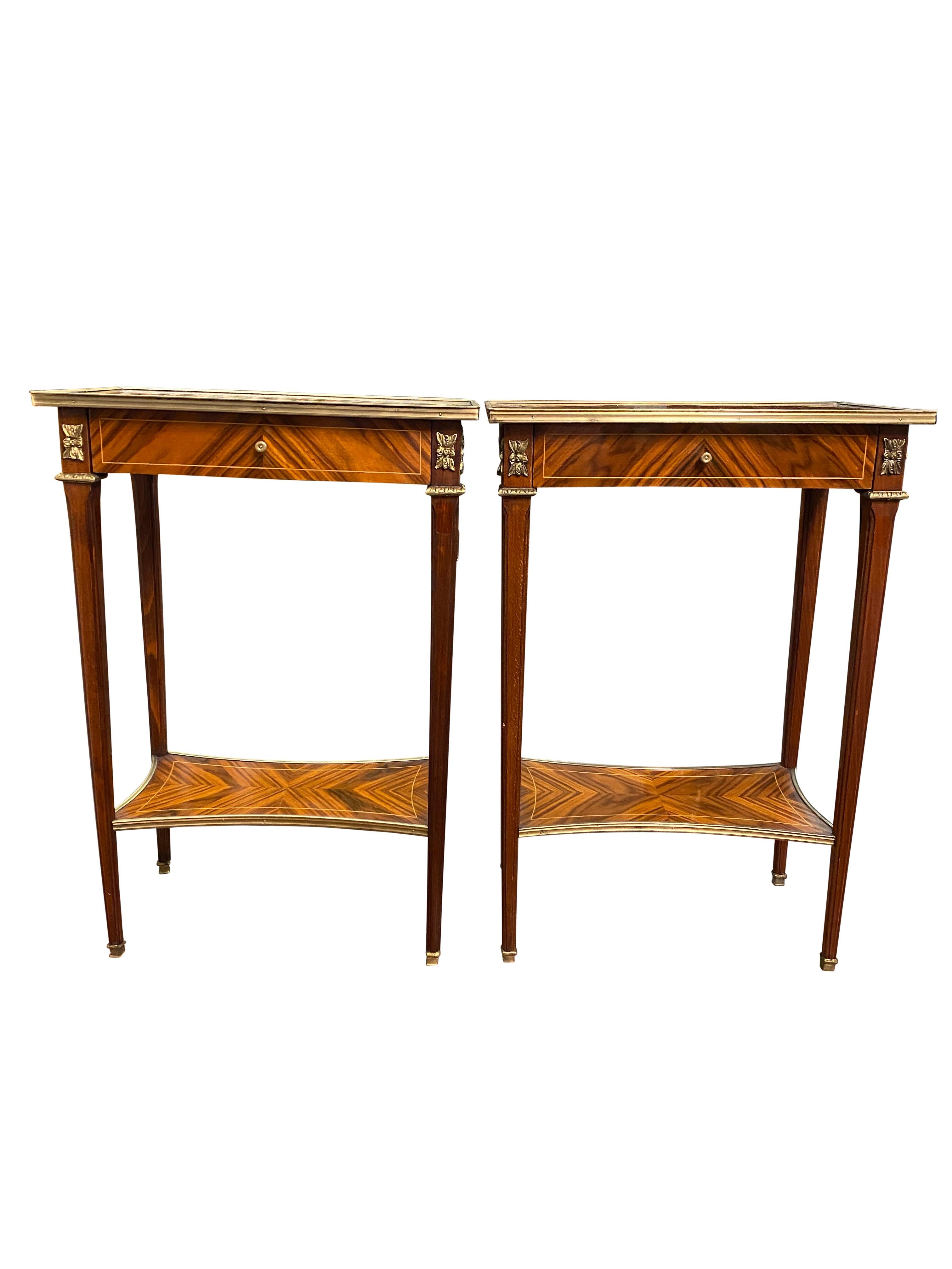 A stunning pair of 20th century English Regency style side tables. A gorgeous and elegant design perfect for modern interiors.