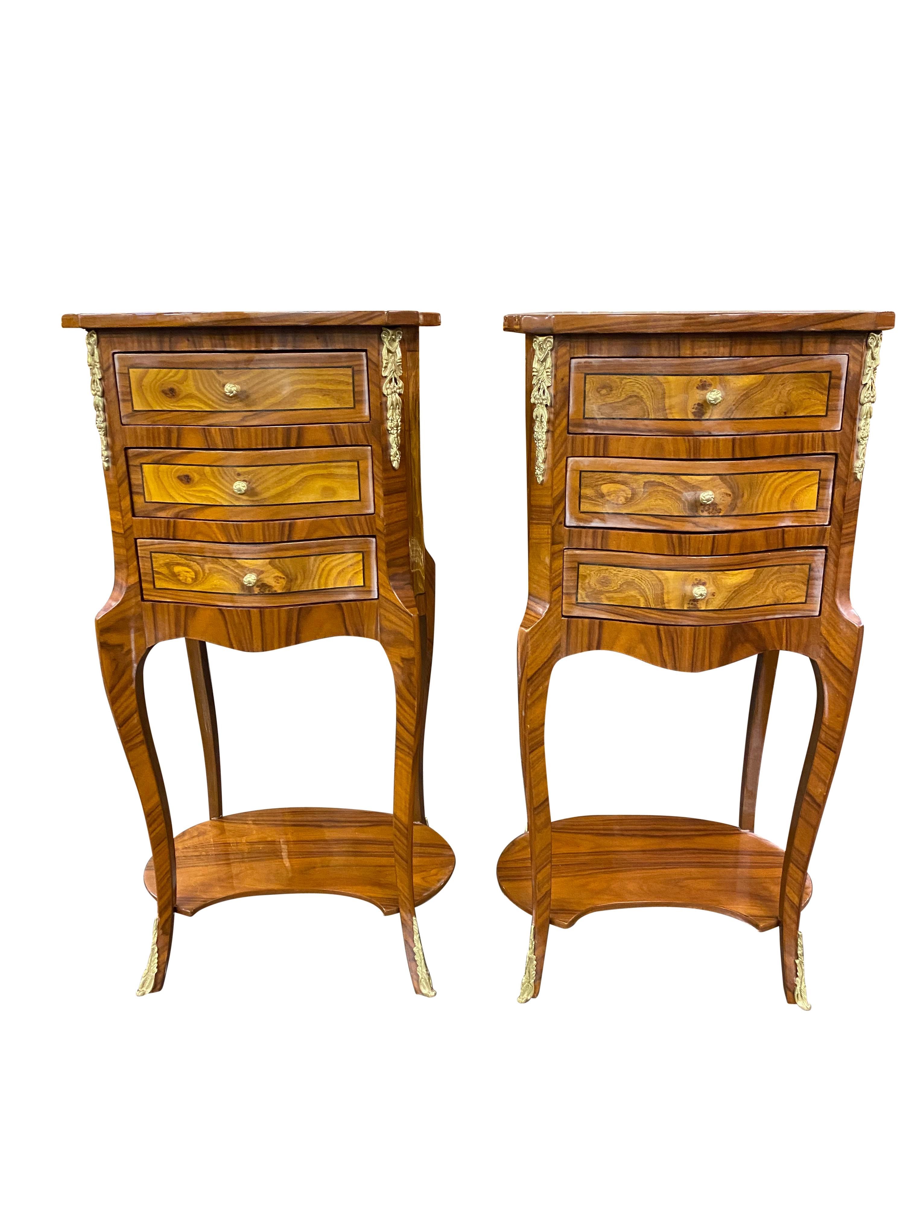 A stunning pair of 20th Century English Regency style side tables. A gorgeous and elegant design perfect for modern interiors.
