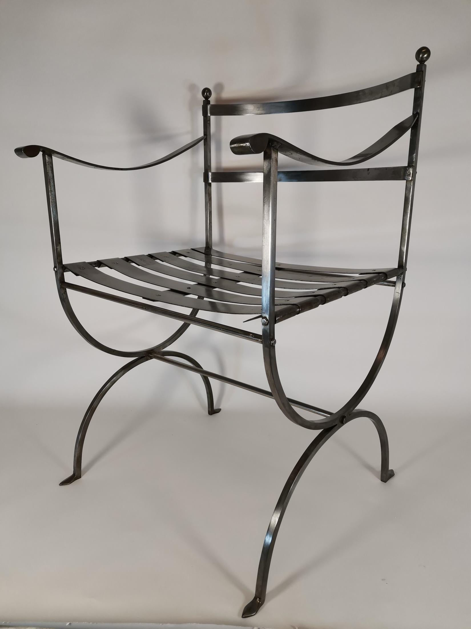 Pair of polished wrought iron armchairs dating from the 70s. French work. Neo-Gothic style. Beautiful work done by hand. Measures: 54 x 86 x 48 cm 3250 EURO.