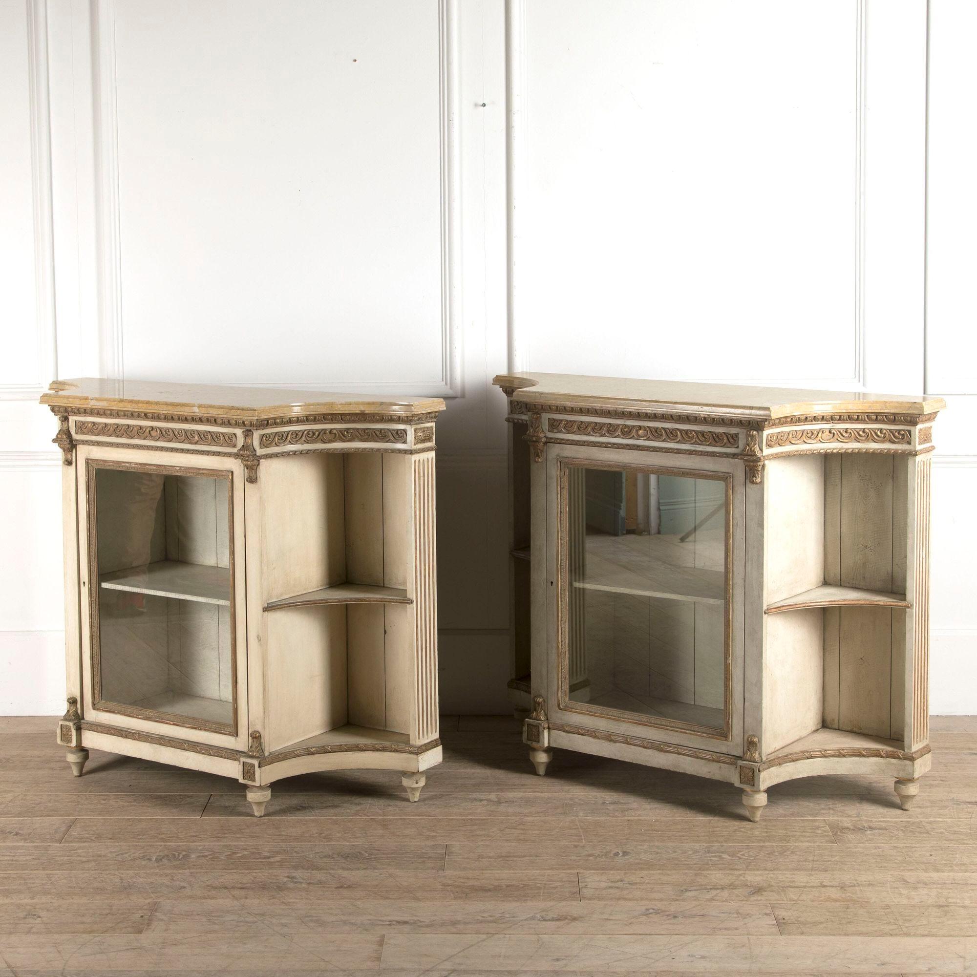 Rare pair of 20th Century French display buffets.
This pair embody much of the Louis XVI style, particularly in overall form, such as the quadrant corners, and the feet. They also demonstrate earlier 18th Century influences, particularly in the