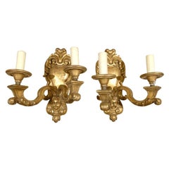 Pair of 20th Century French Giltwood Two-Arm Sconces with Cherub Faces