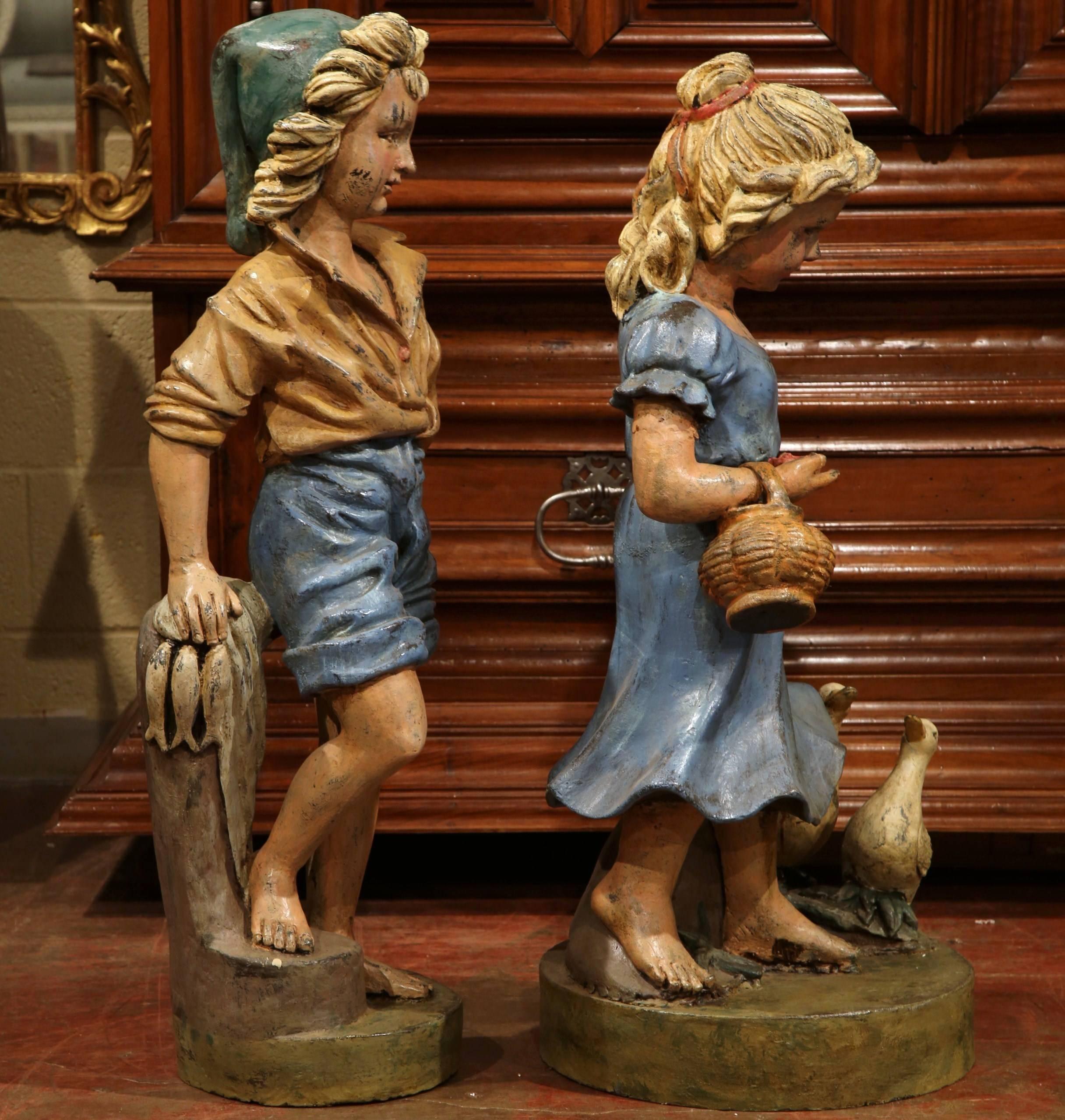 Pair of 20th Century French Hand Painted Iron Boy and Girl Sculptures For Sale 1