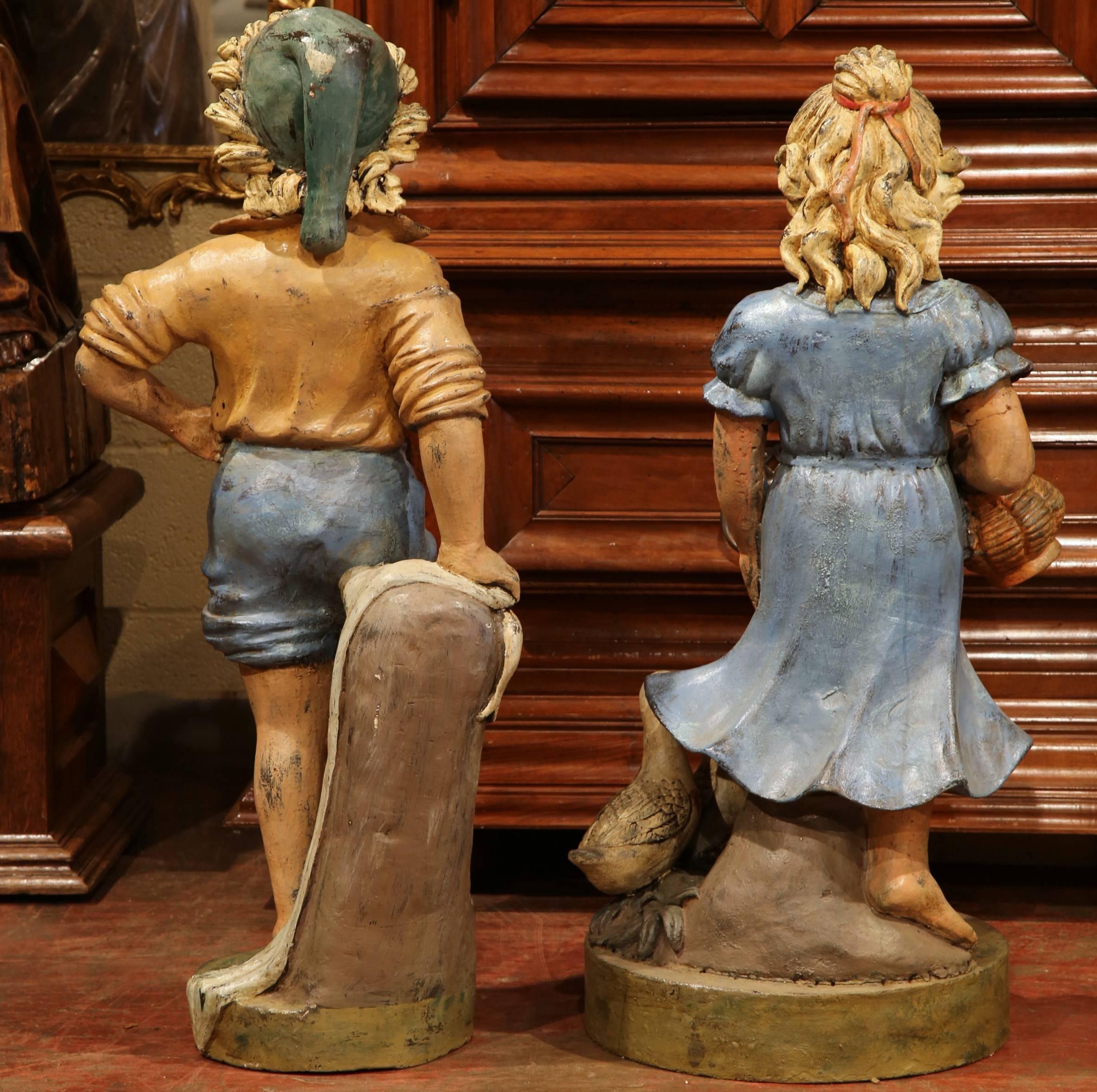 Pair of 20th Century French Hand Painted Iron Boy and Girl Sculptures For Sale 3
