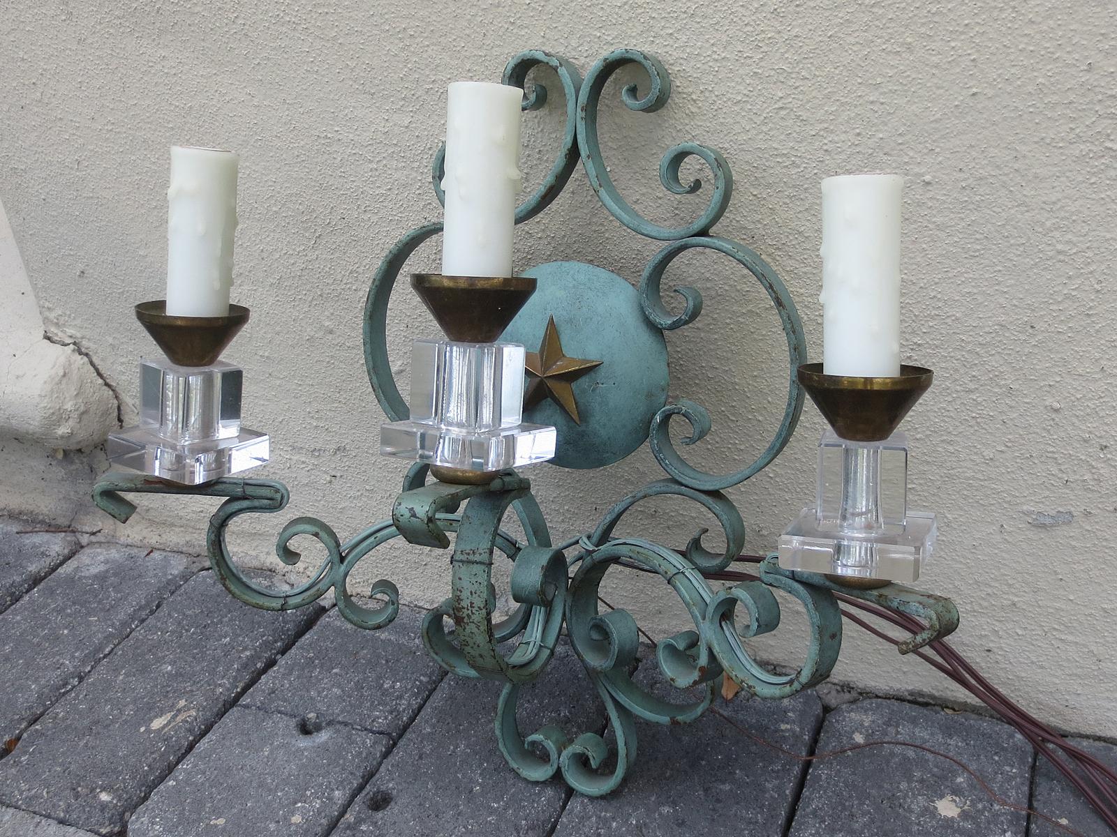 Pair of 20th century French iron and crystal sconces with star motif
New wiring.