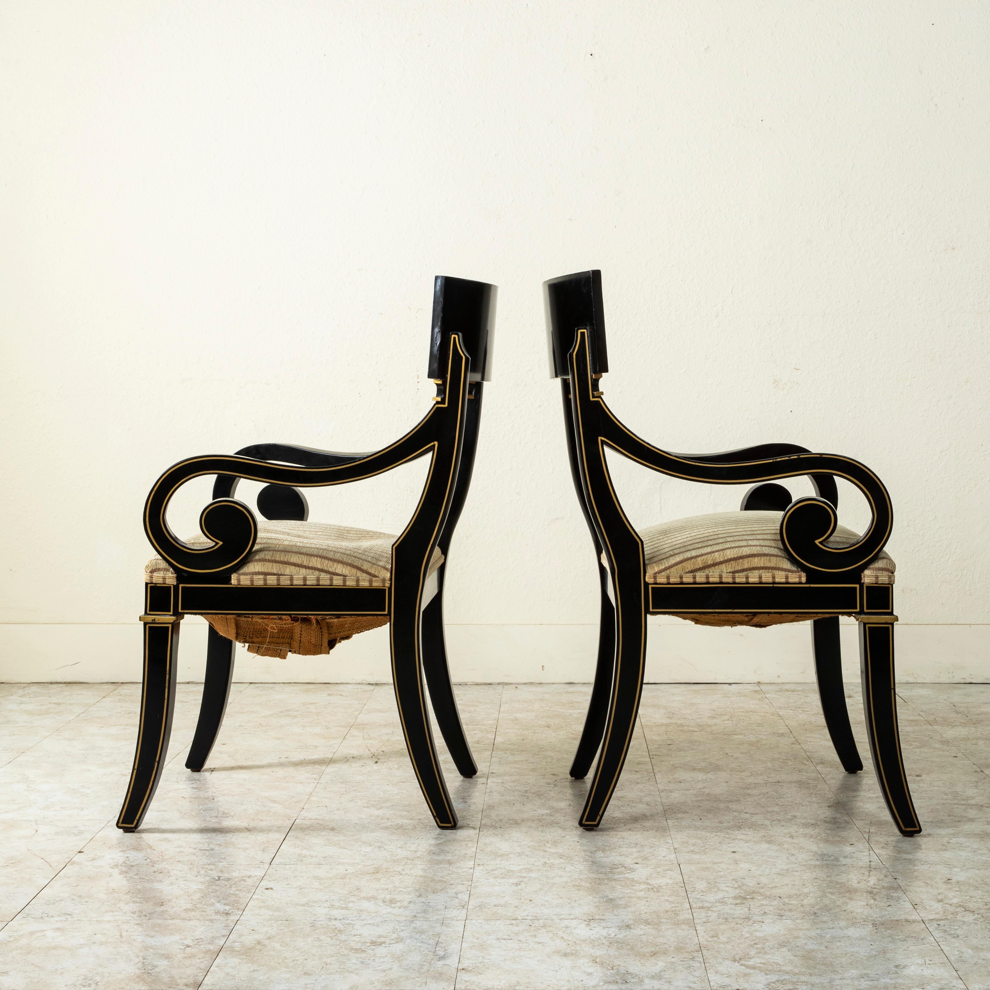 Pair of 20th Century French Restauration Style Painted Black and Gold Armchairs In Good Condition In Fayetteville, AR