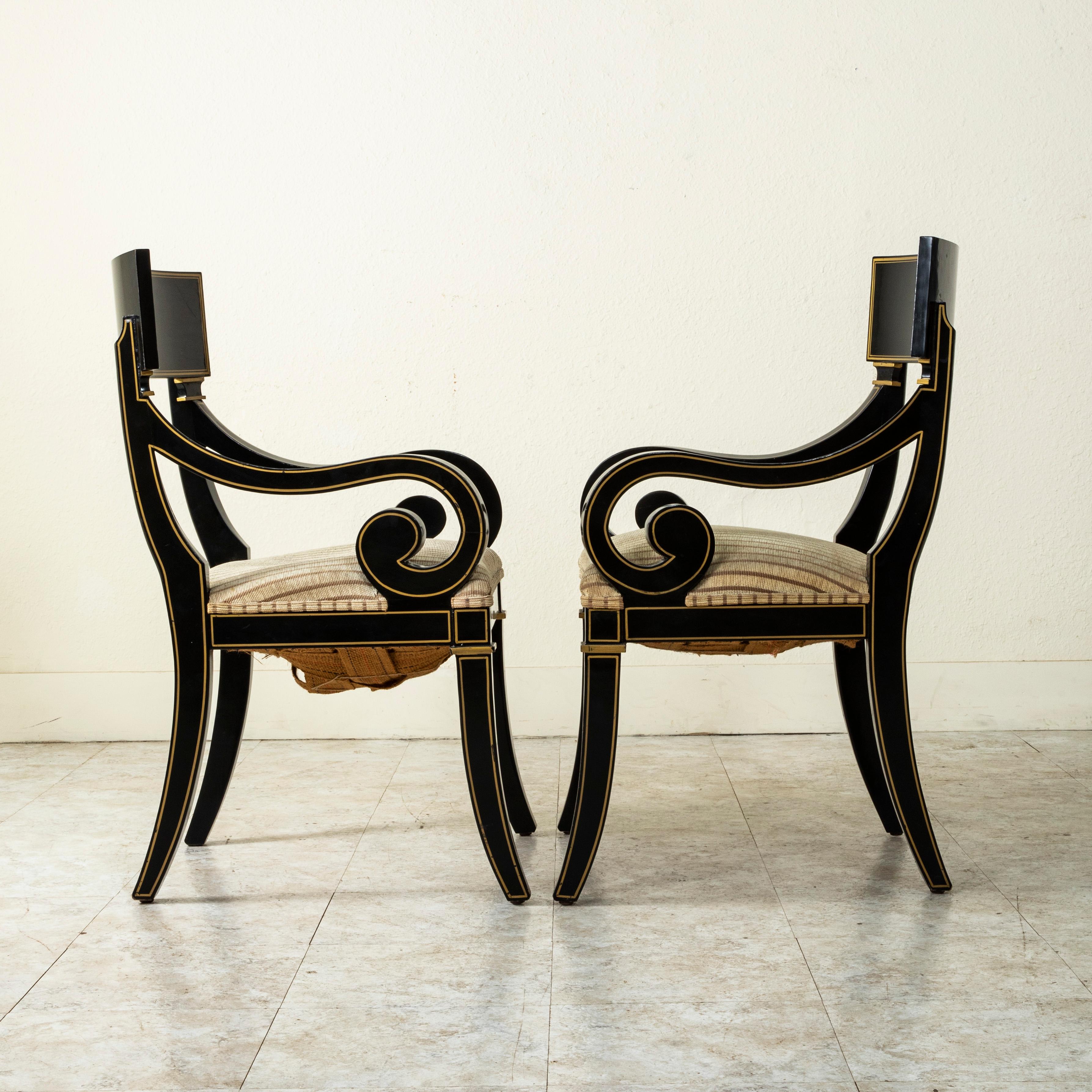 Pair of 20th Century French Restauration Style Painted Black and Gold Armchairs 1