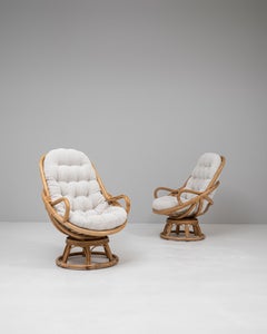 Pair Of 20th Century French Upholstered Bamboo Swivel Armchairs