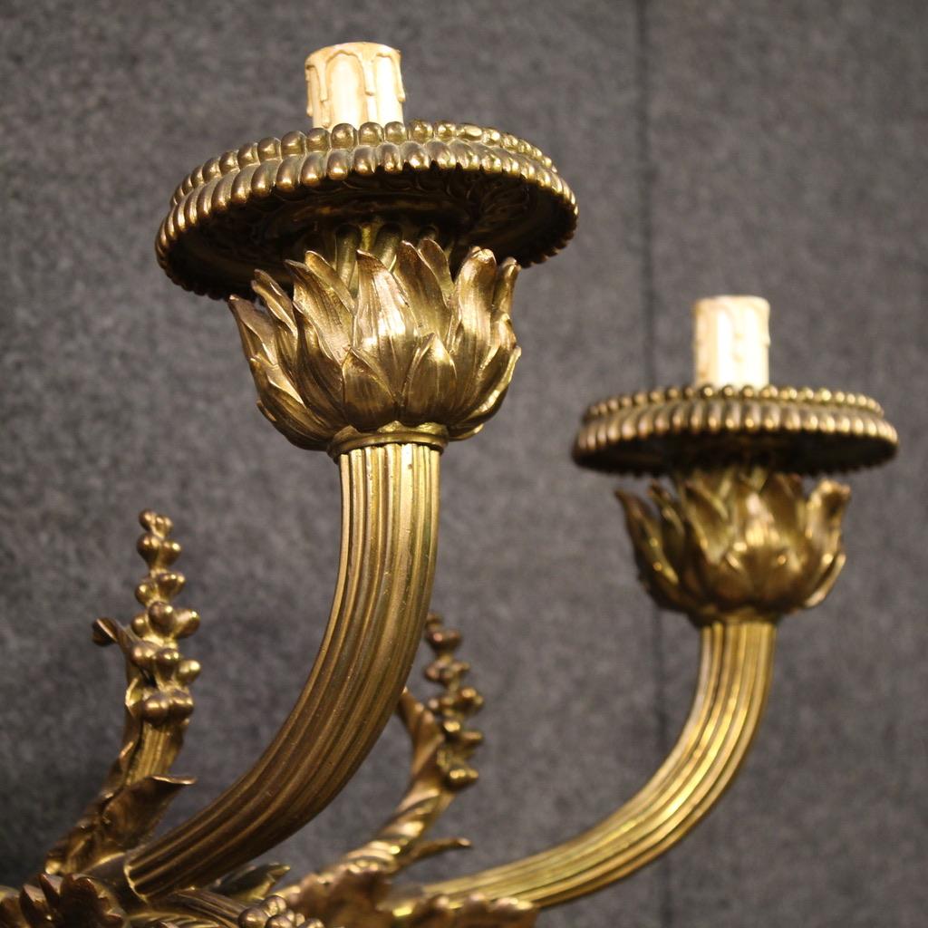 French Pair of 20th Century Golden and Chiseled Bronze Louis XVI Style Wall Lamps, 1950 in vendita