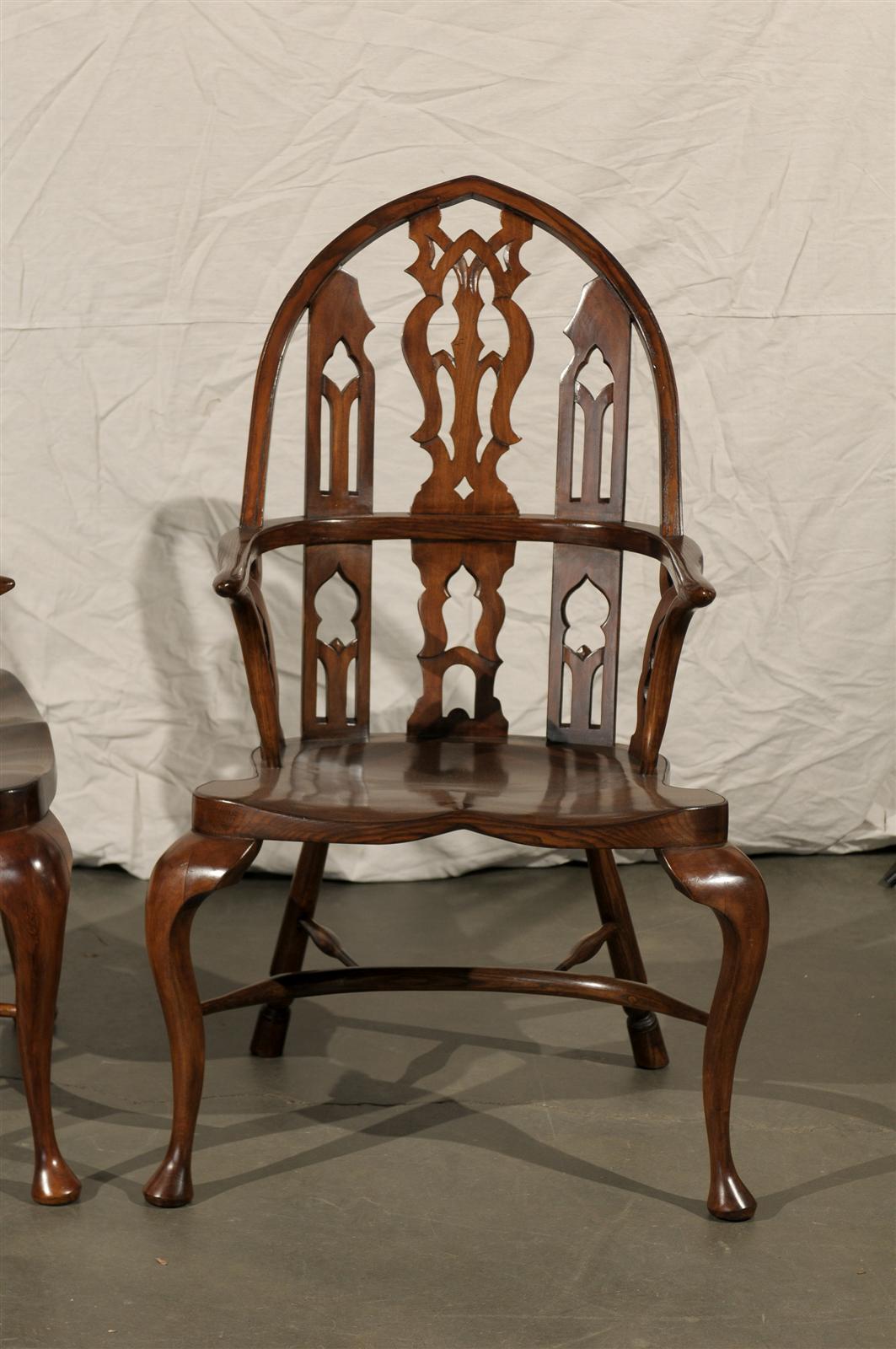 Pair of 20th century Gothic style Windsor armchairs
Measures: 27.5