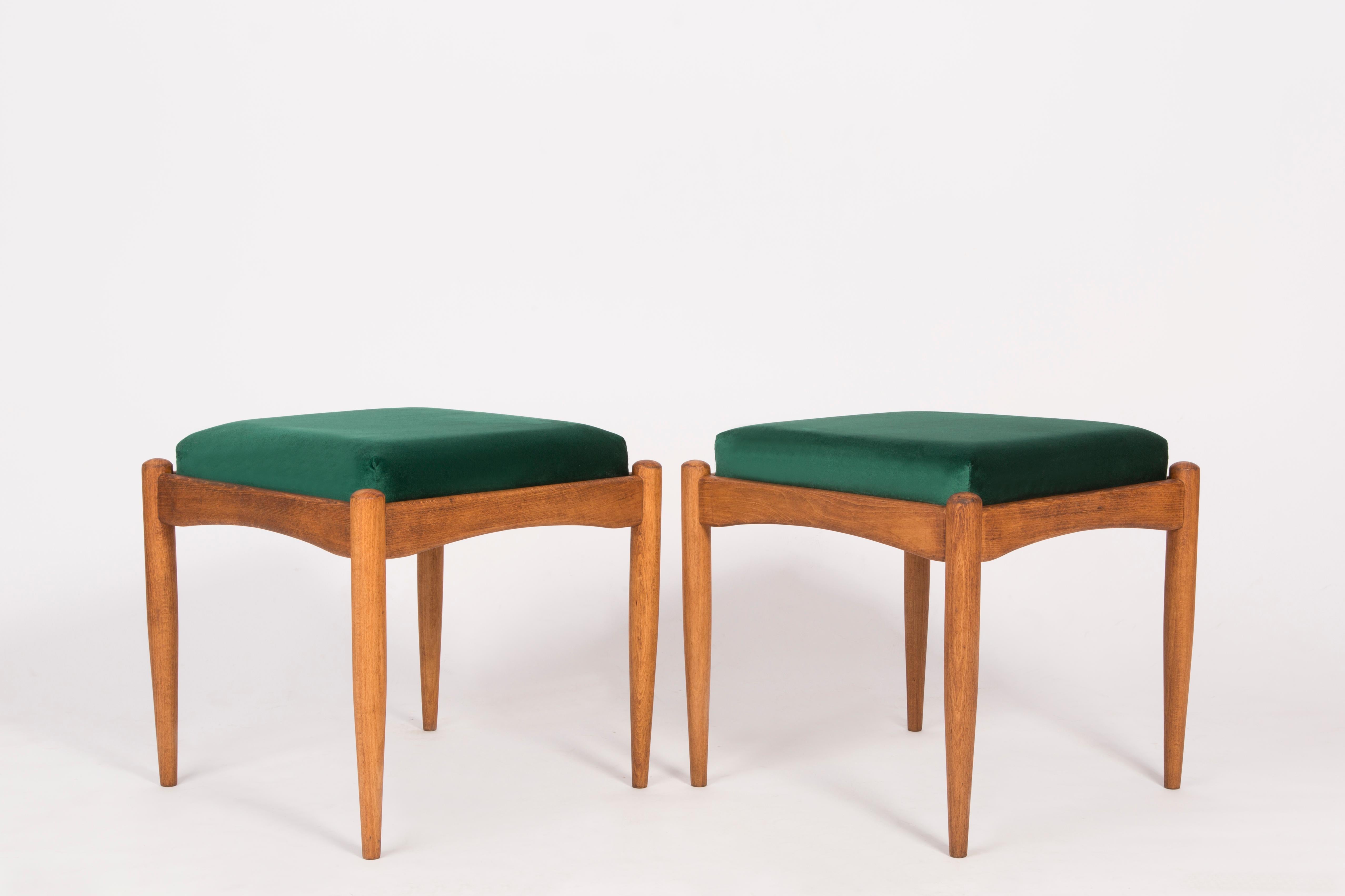 Stools from the turn of the 1960s and 1970s. Beautiful velvet green upholstery. The stools consists of an upholstered part, a seat and wooden legs narrowing downwards, characteristic of the 1960s style. We can prepare this pair also in another color