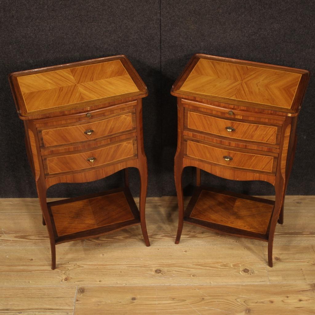 Pair of 20th century French bedside tables. Beautiful furniture of pleasant decor inlaid in walnut, mahogany, maple and rosewood. Small tables finished for the center, equipped with two drawers, a small removable front desk top and wooden top in