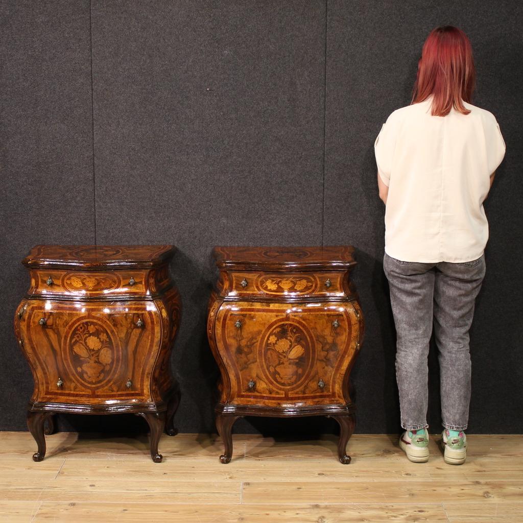 Pair of Lombard bedside tables from the mid-20th century. Curved and rounded furniture in Louis XV style, finely inlaid with floral decorations in walnut, burl, rosewood, maple, ebonized wood and fruitwood. Bedroom or living room bedside tables, of