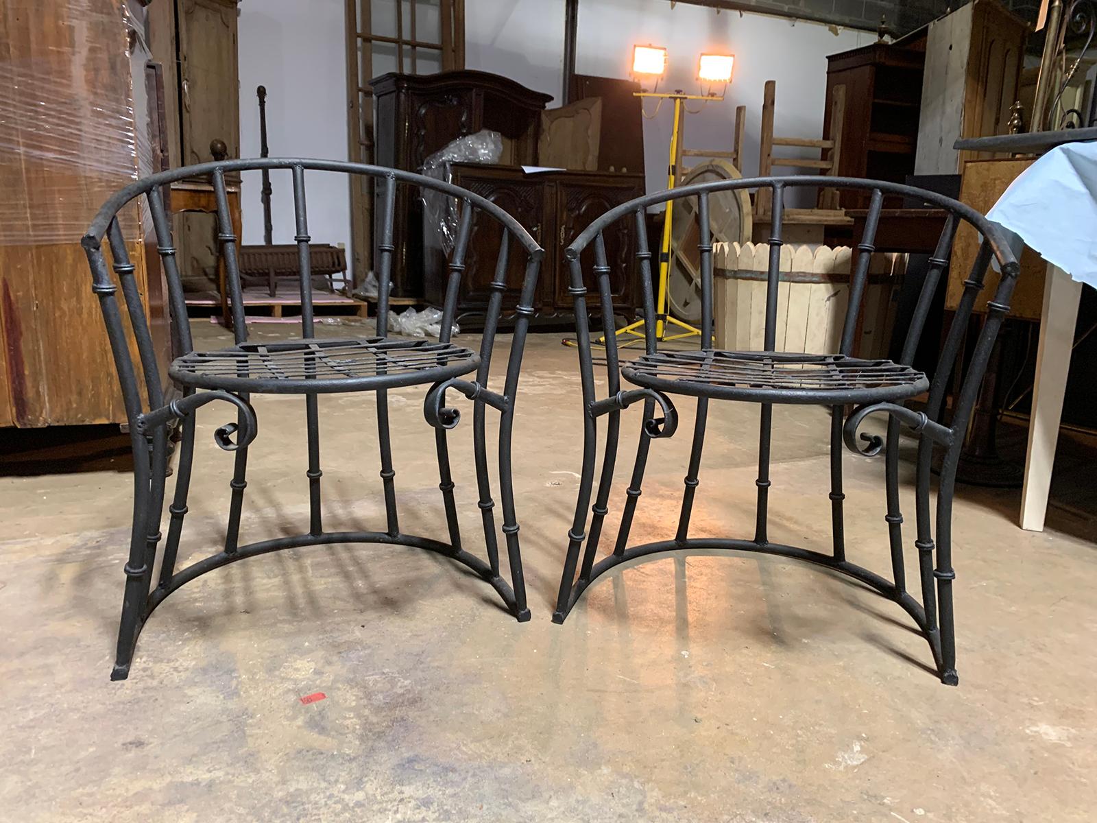 Pair of 20th century iron barrel form chairs
Measures: 23.75' W x 21