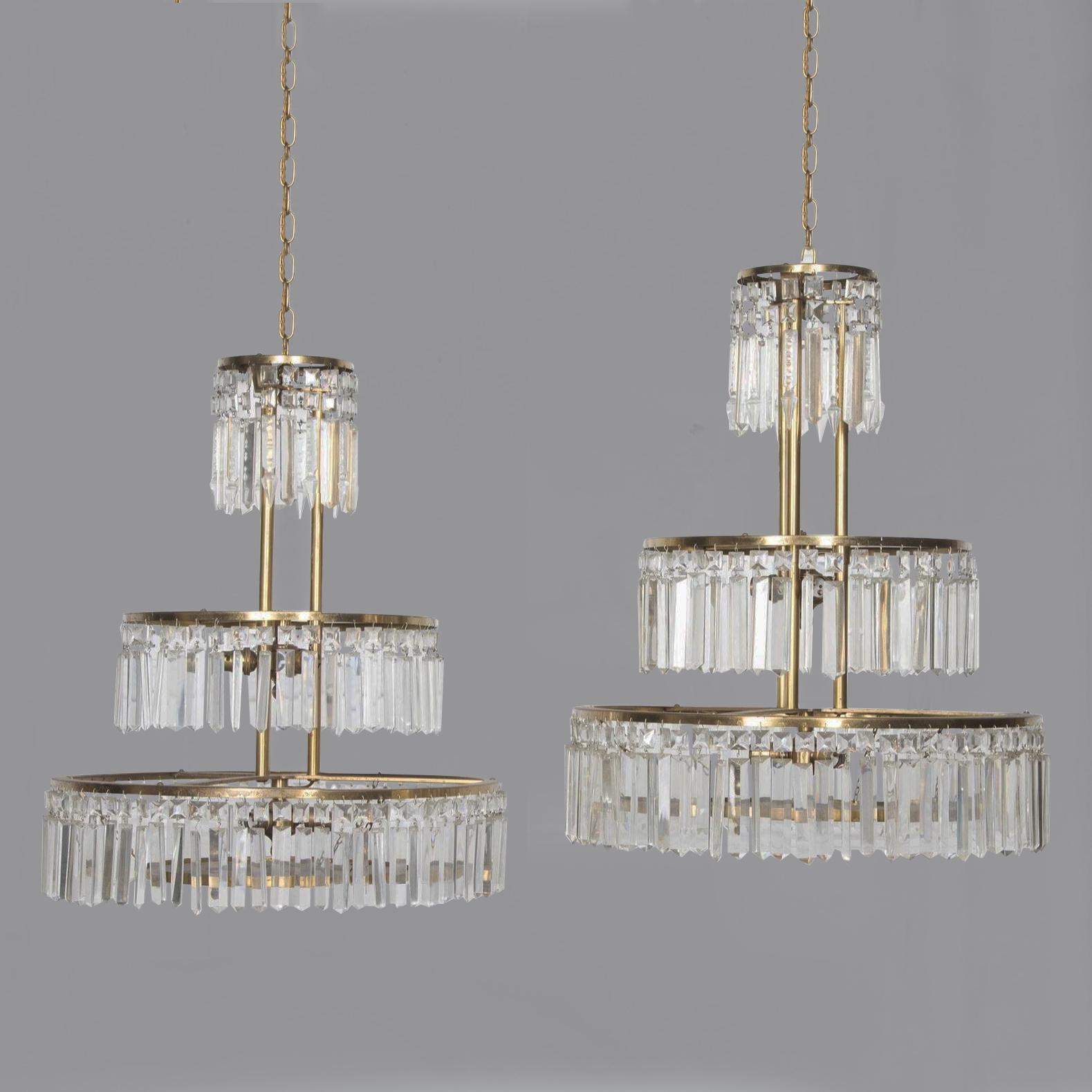 Neoclassical Pair of 20th Century Italian Brass Three Tier Chandeliers For Sale
