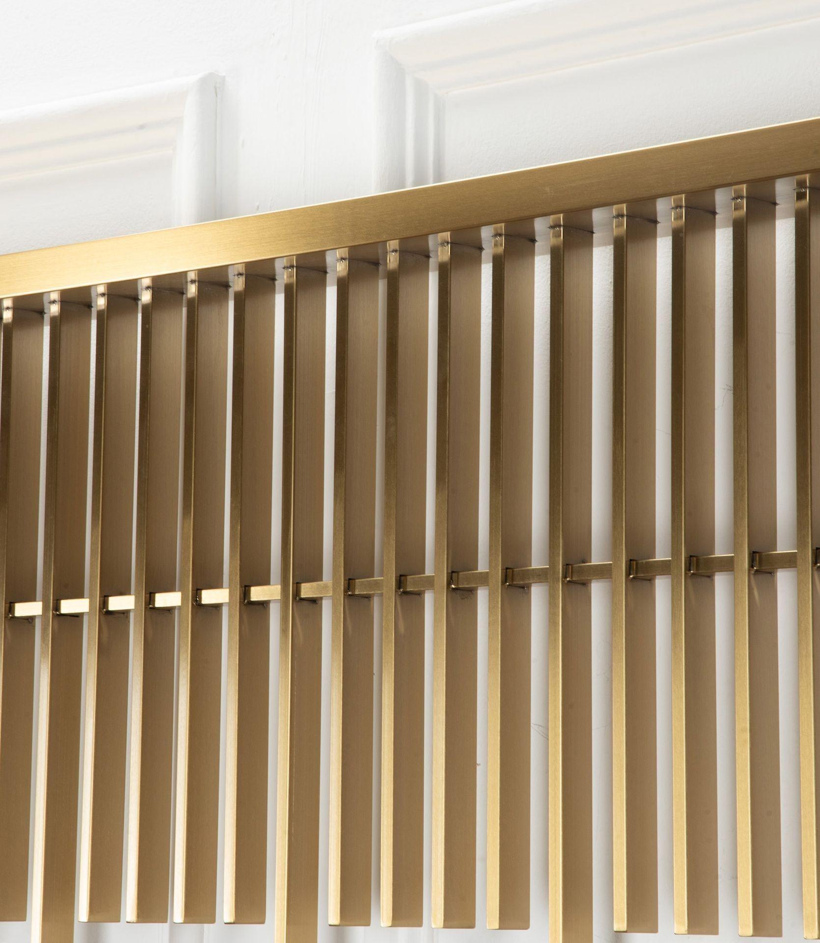 A stylish pair of 20th Century Italian brass room divider panels.
In the Brutalist style. Standing on small cylindrical legs.
Circa 1975.