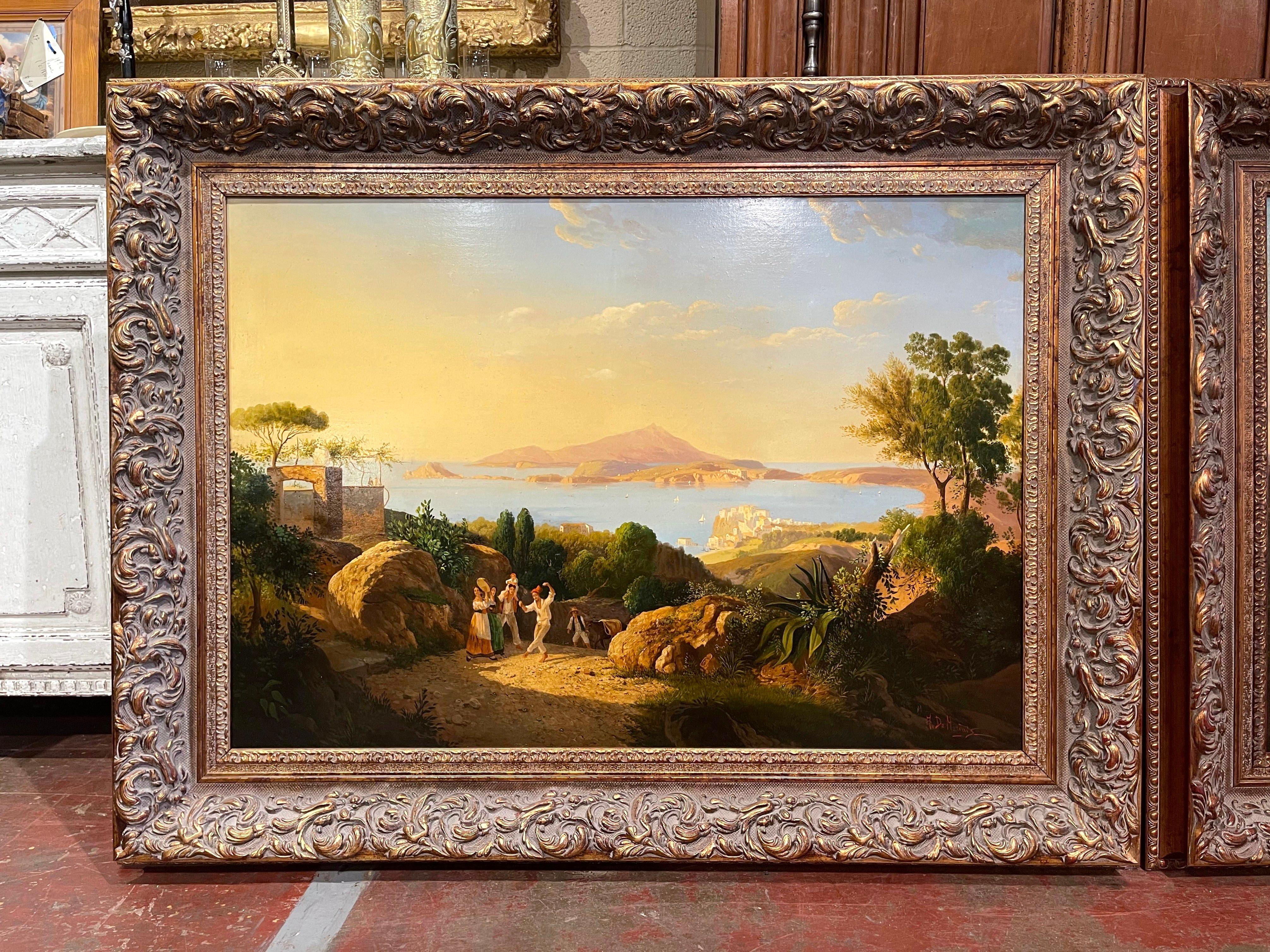Set in ornate and carved gilt wood frames, these elegant oil on canvas paintings depict two Italian coastal scenes. Attracted to its dramatic vistas, volcanoes, exotic peasants, and classical ruins, landscape painters of the 18th and 19th centuries