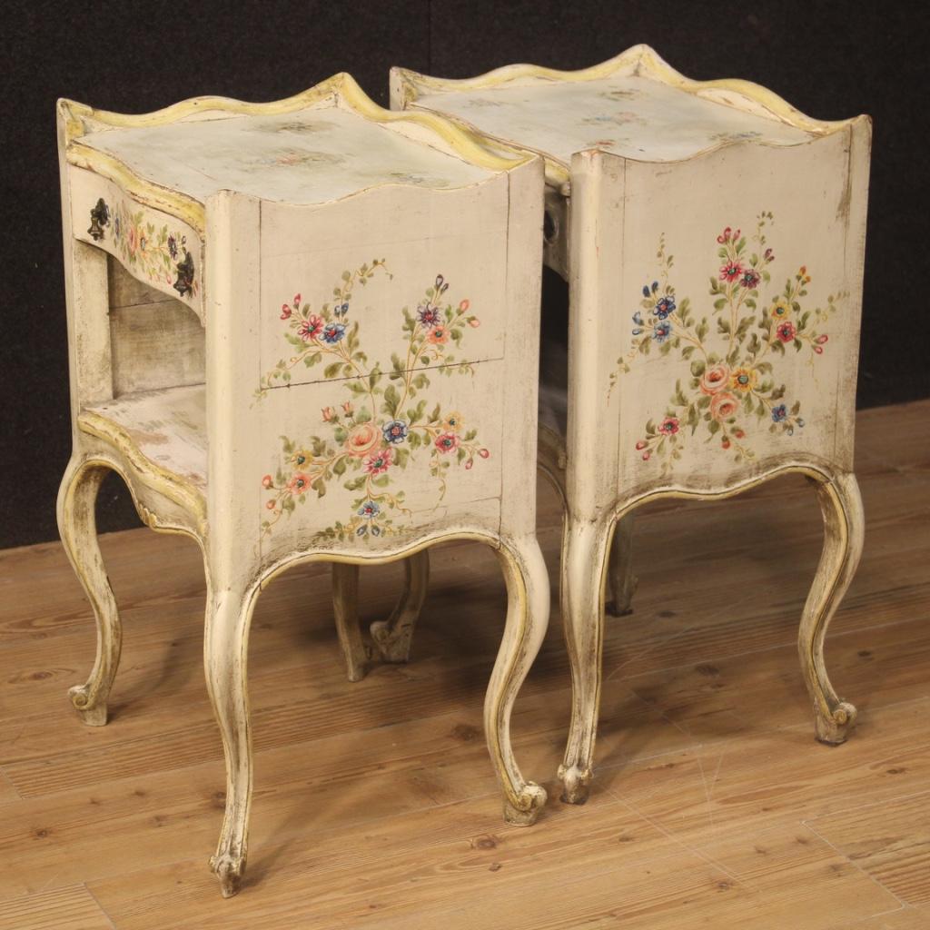 Pair of Venetian bedside tables from 20th century. Furniture in lacquered and hand painted wood with very pleasant floral decorations. Bedside tables with a wooden top (with some signs of wear, see photo) a front drawer and an open compartment of
