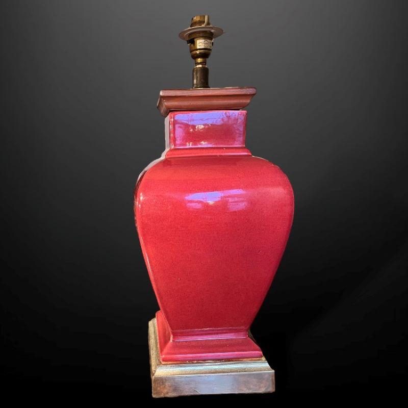 Extremely attractive pair of 20th Century Large Red Ceramic Table lamps on square gilt bases.