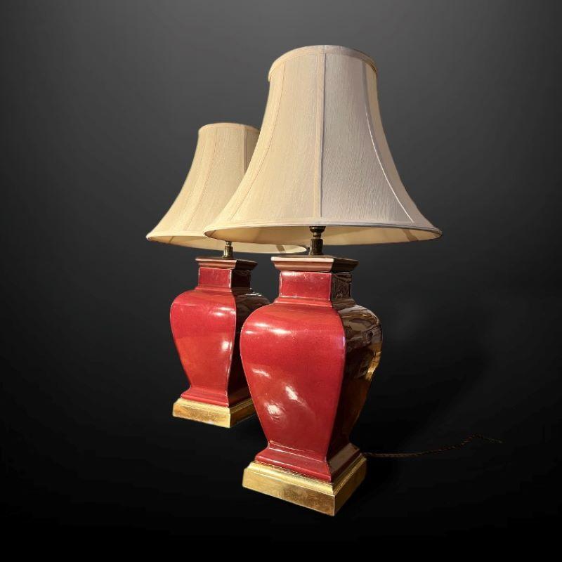 Pair of 20th Century Large Red Table lamps on gilt bases In Good Condition For Sale In Reepham, GB