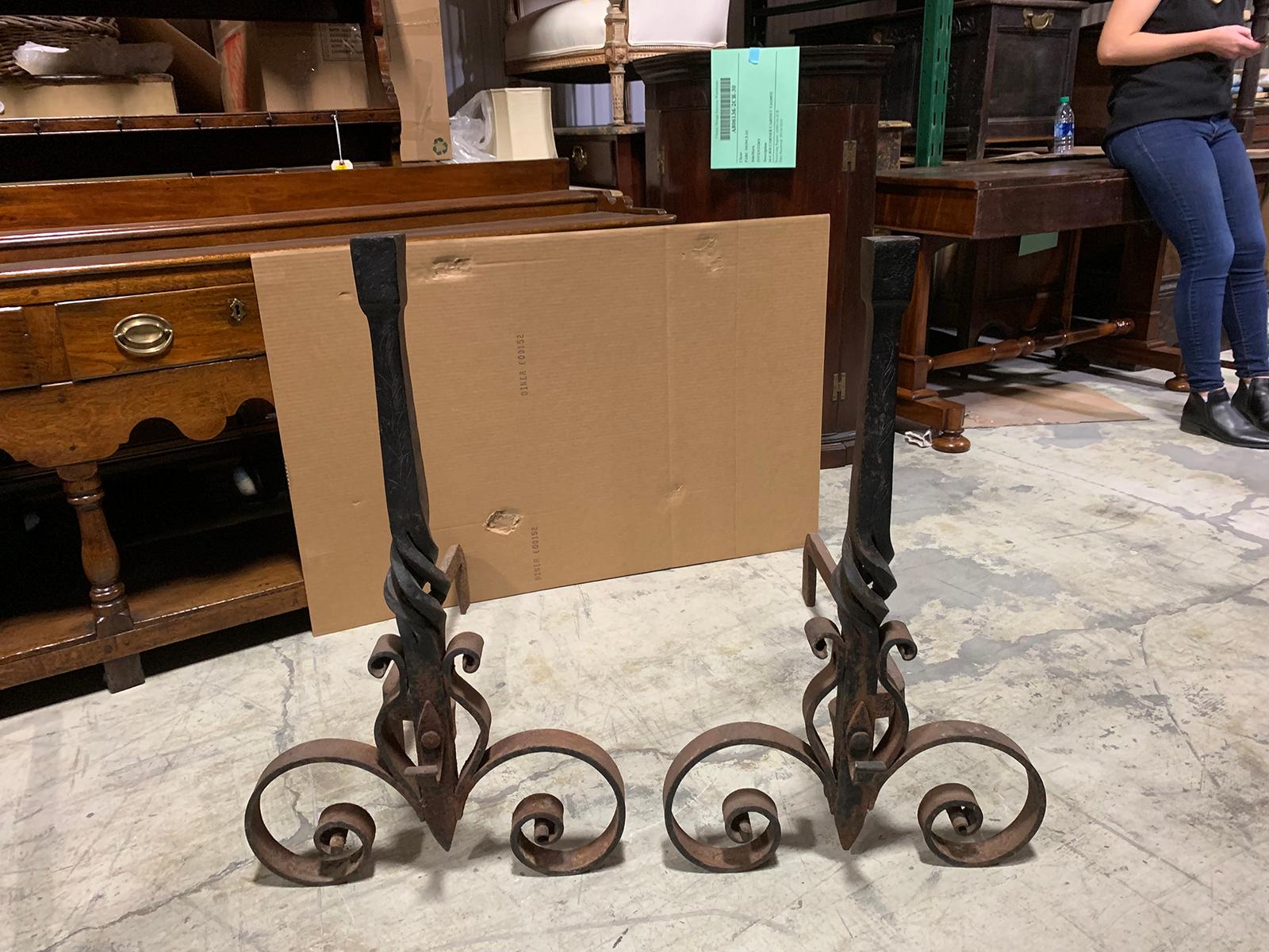 Pair of 20th century large scale wrought iron andirons.