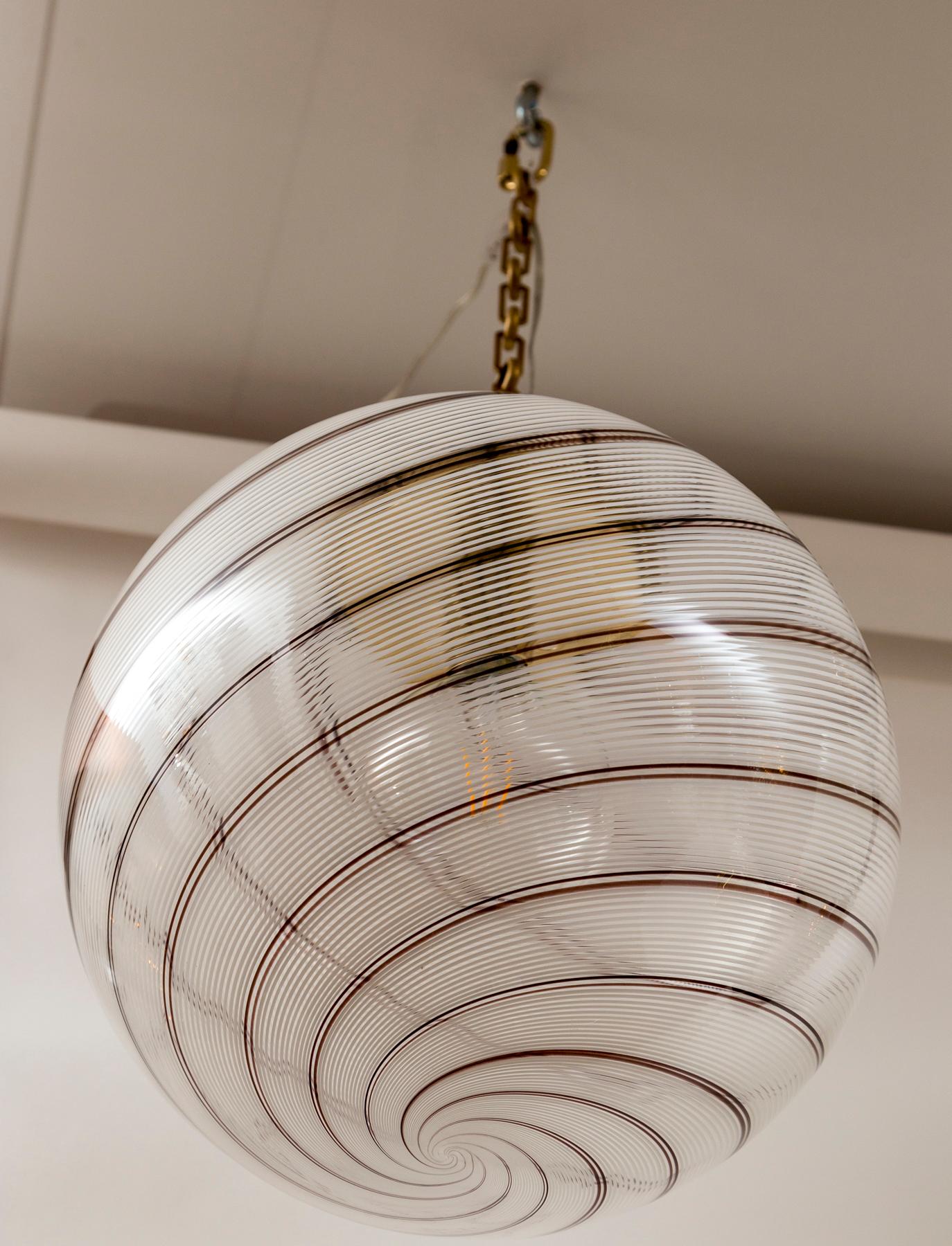 Italian Pair Of 20th Century Large Swirl Globe Shaped Pendants In The Style Of Venini