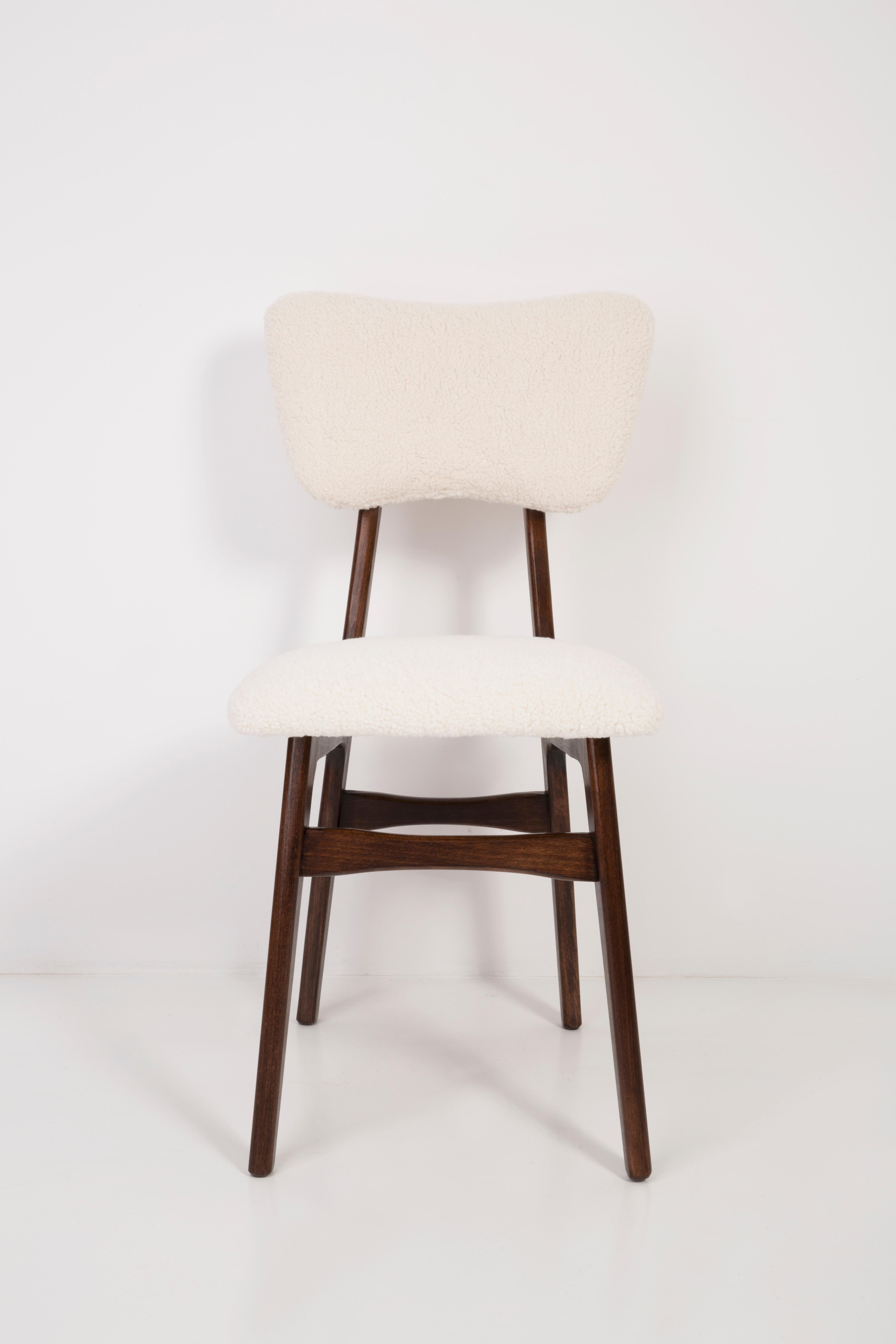 Chairs designed by Prof. Rajmund Halas. Made of beechwood. Chair is after a complete upholstery renovation, the woodwork has been refreshed. Seat and back is dressed in crème, durable and pleasant to the touch boucle fabric. Chair is stable and very