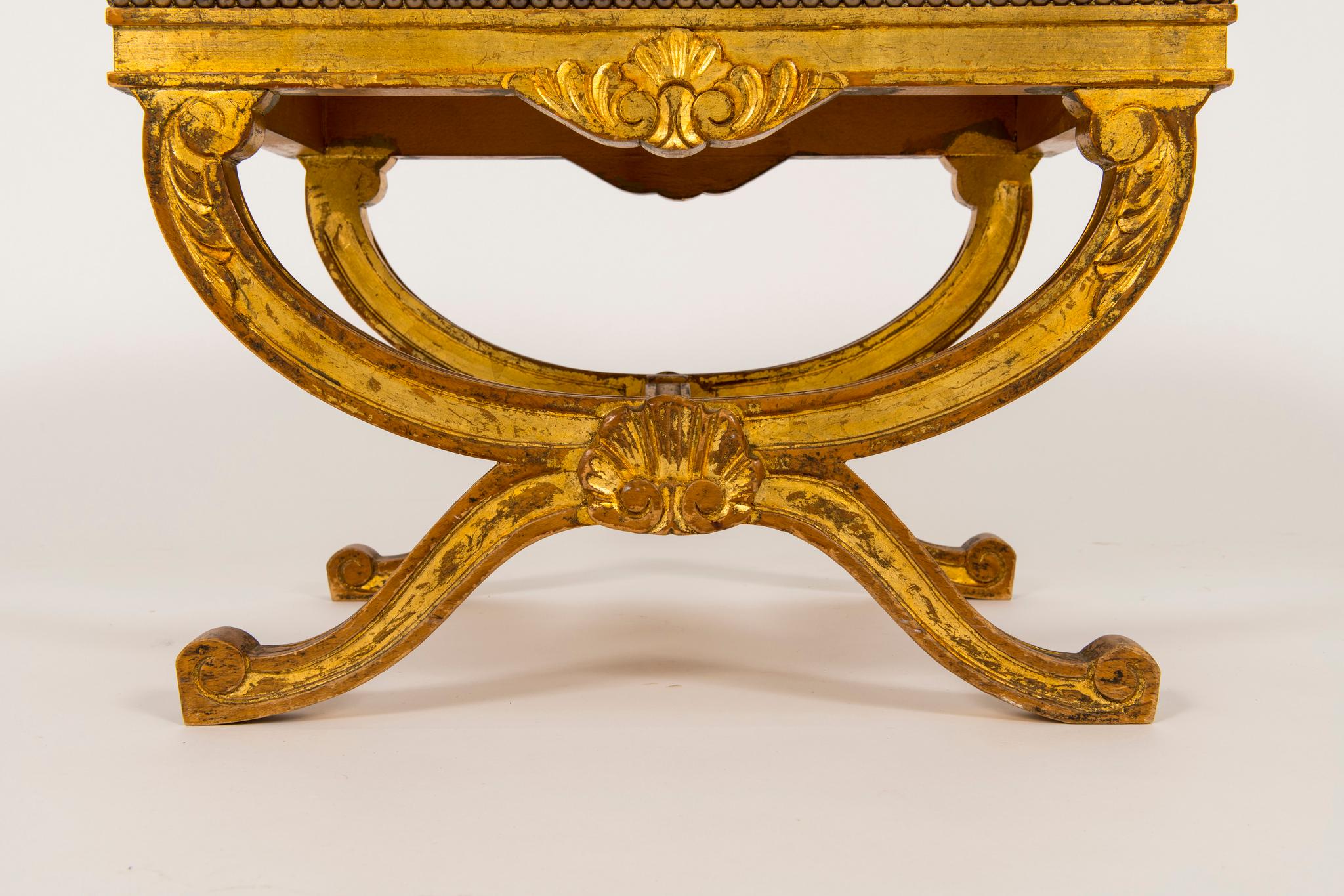 A pair of 20th century Louis XV style giltwood tabourets newly upholstered in a Dedar tiger cut velvet.