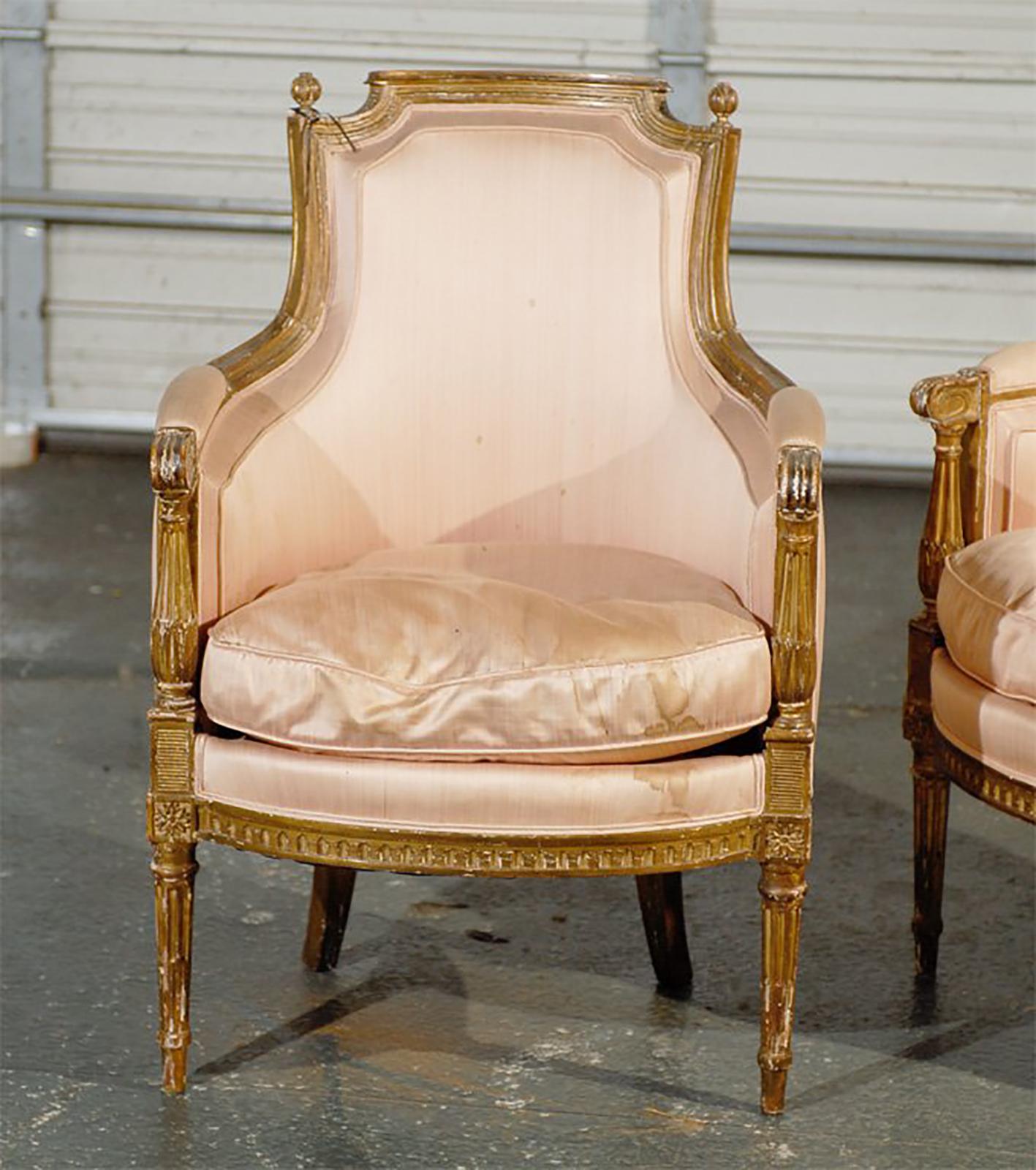 Pair of 19th-20th century Louis XVI style giltwood bergère chairs.
Seat:21