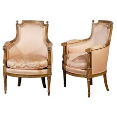 Pair of 20th Century Louis XVI Style Giltwood Bergère Chairs