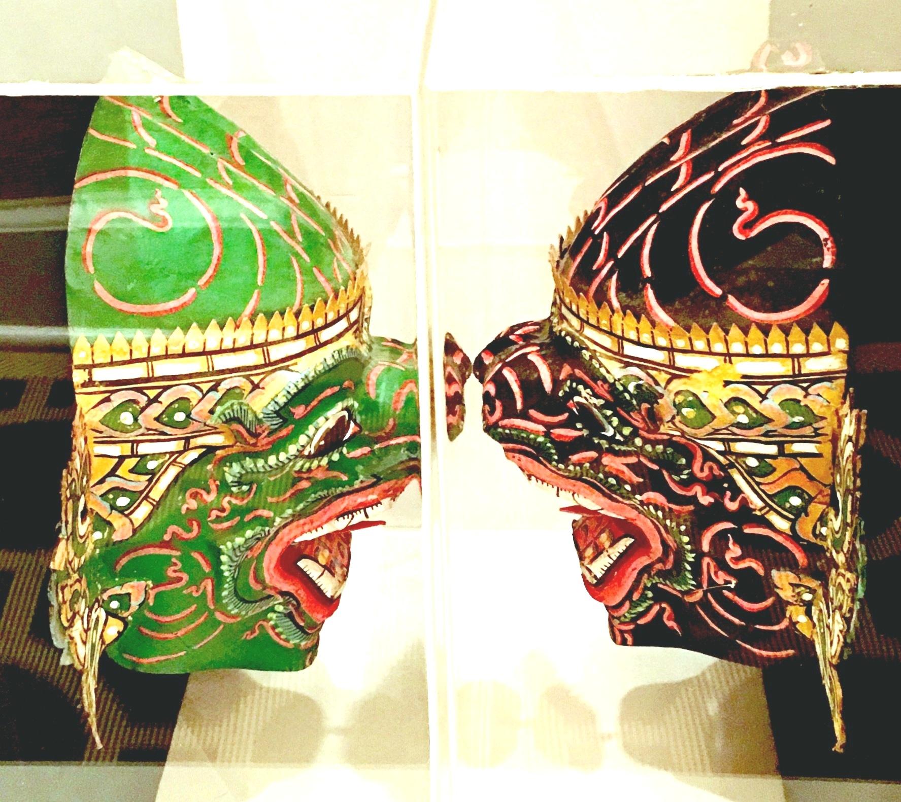 Pair of 20th Century Lucite Shadow Box Mounted Hand Painted Tribal Masks In Good Condition For Sale In West Palm Beach, FL