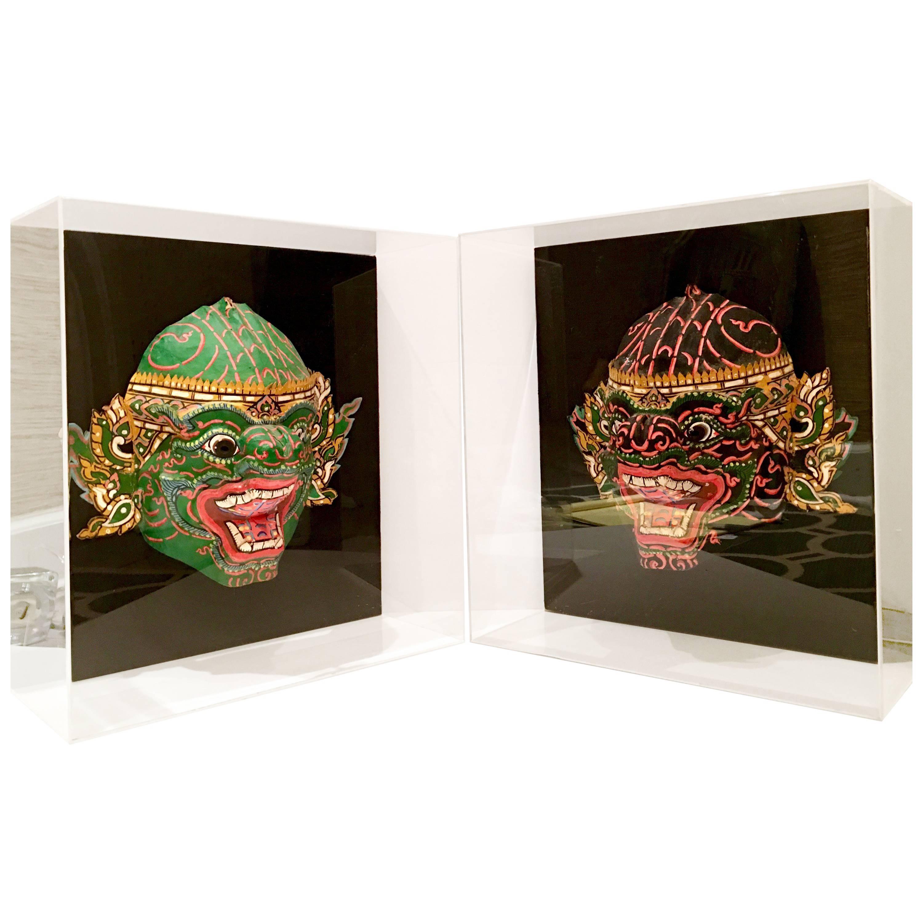 Pair Of 20th Century Lucite Shadow Box Mounted Hand-Painted Tribal Masks For Sale