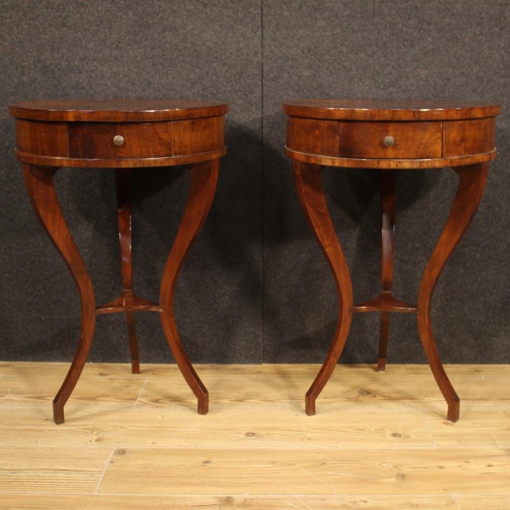 Pair of French bedside tables from the mid-20th century. Furniture carved in mahogany and beech woods of beautiful line and construction. Bedside tables finished for the center complete with a drawer each of discrete capacity. Wooden top of good