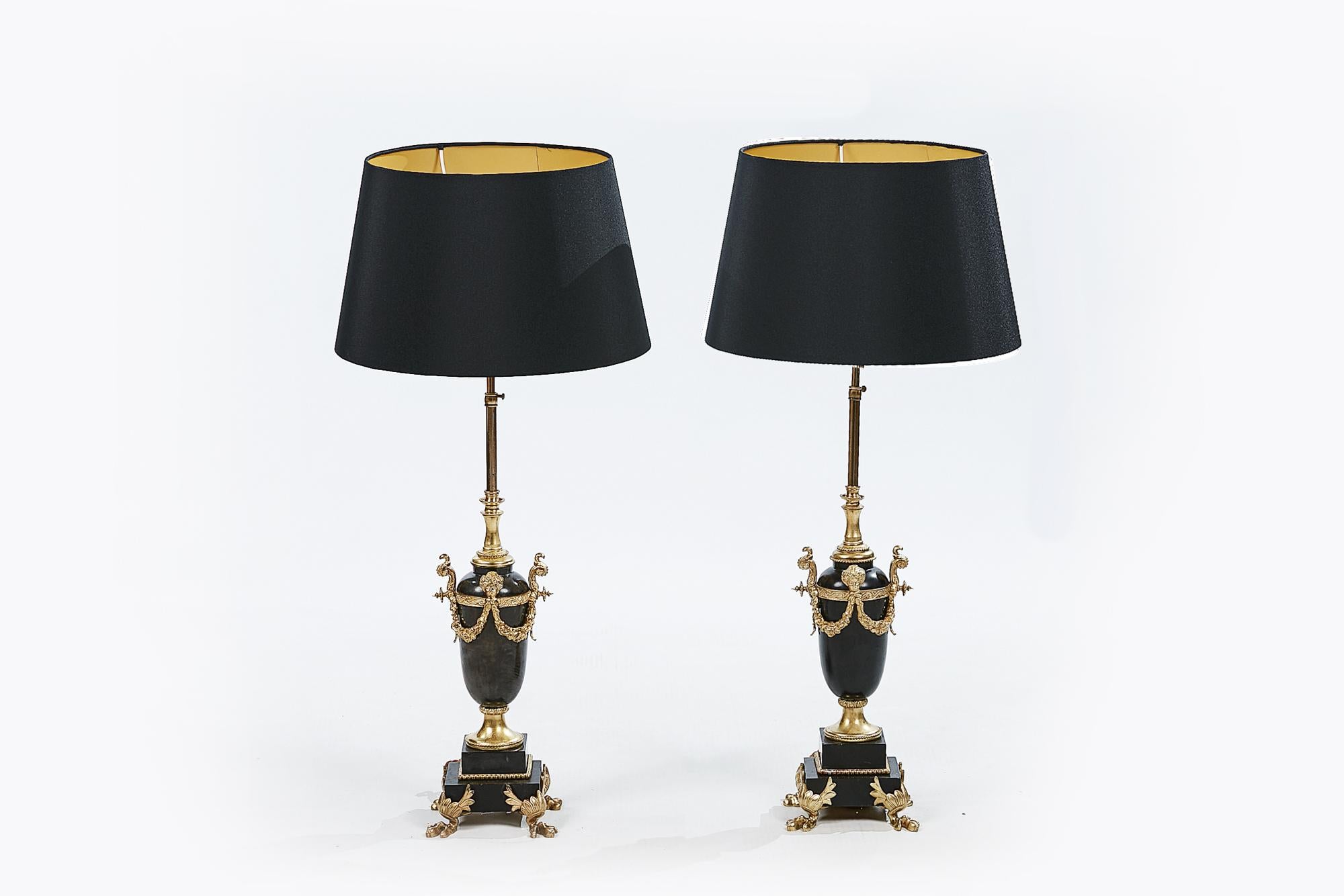 Pair of 20th century marble and gilt lamps in the neoclassical style.