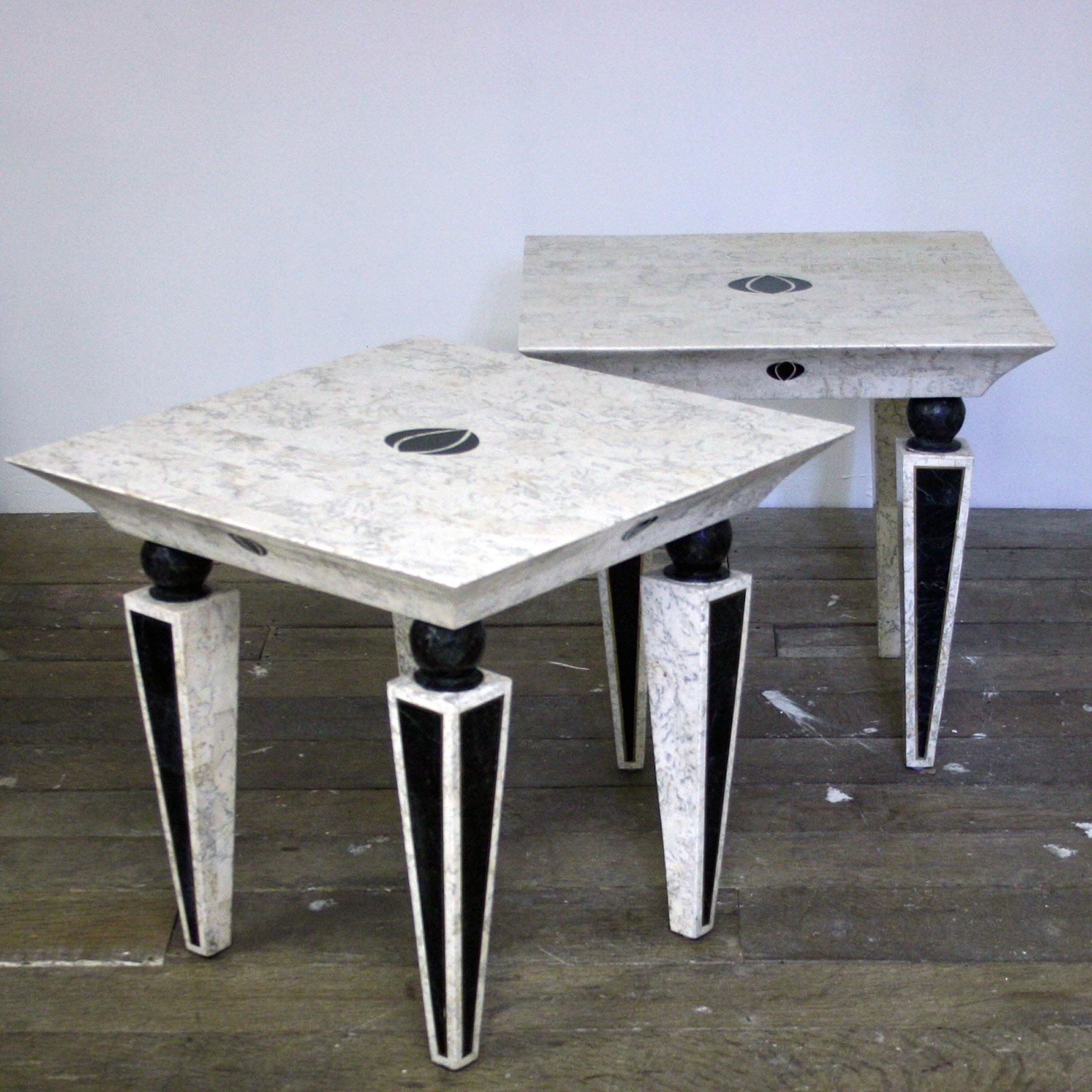 A pair of late 20th Century side tables by Maitland-Smith, Tesselated marble with black marble leave and a brass inlay.