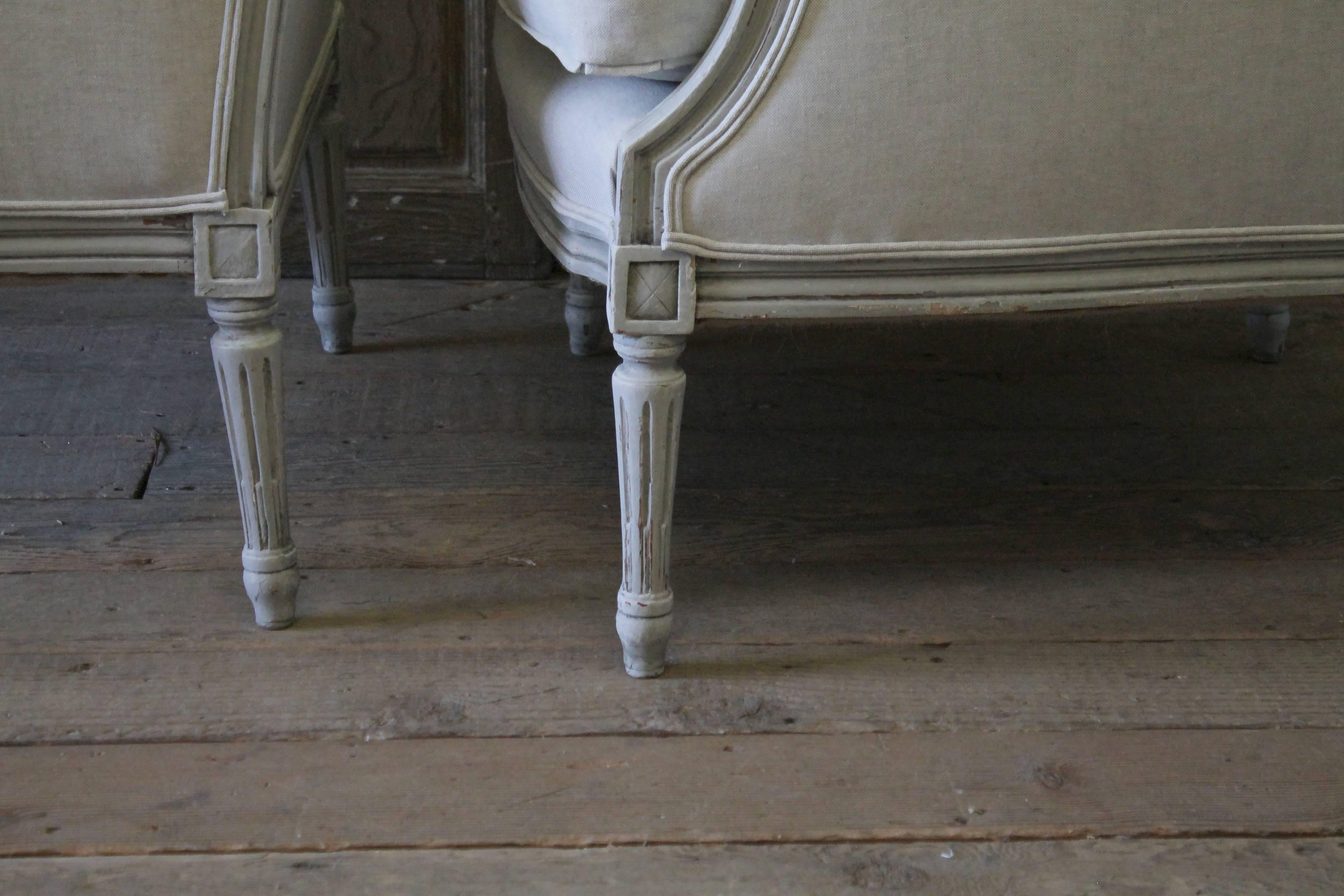 Pair of 20th Century Painted and Upholstered Louis XVI Style Bergere Chairs 8